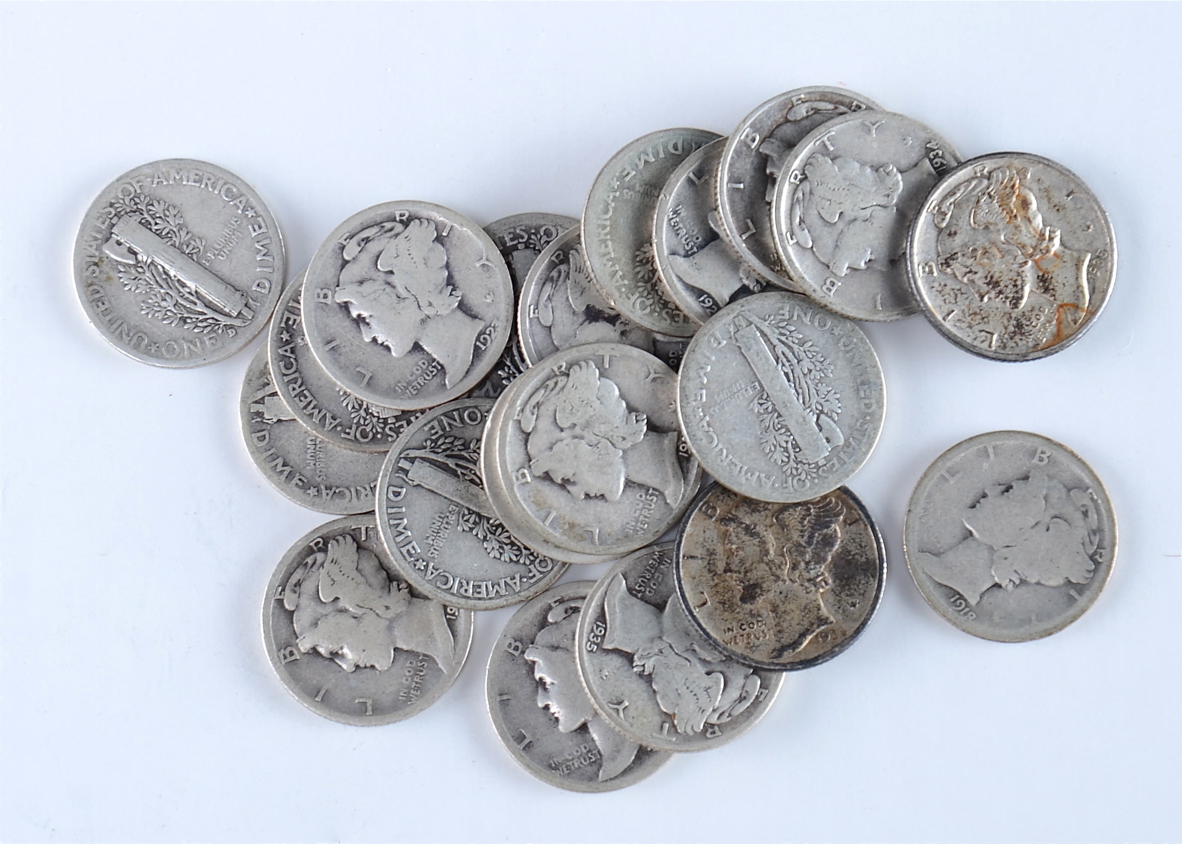 Group of (20) silver Mercury dimes including the following: 1916, 1917, 1918 D, 1919, 1920, 1923, 1924, 1925, 1926, 1927, 1928, 1929, 1929 D, 1930, 1934, 1934 D, 1935, 1935 D, 1935 S, and 1936