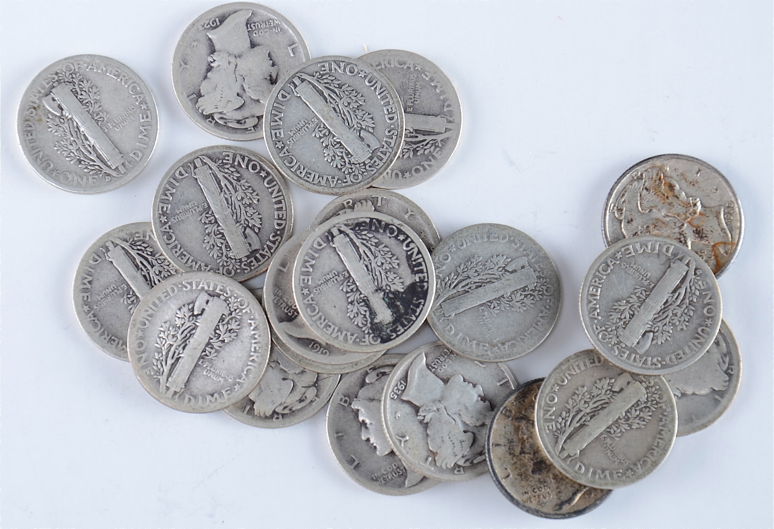 Group of (20) silver Mercury dimes including the following: 1916, 1917, 1918 D, 1919, 1920, 1923, 1924, 1925, 1926, 1927, 1928, 1929, 1929 D, 1930, 1934, 1934 D, 1935, 1935 D, 1935 S, and 1936