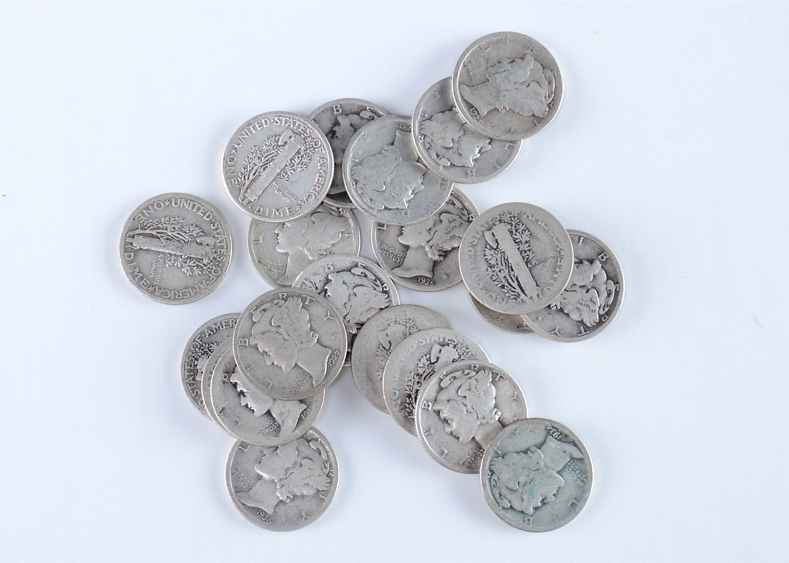 Group of (20) silver Mercury dimes including the following: 1917, 1920, 1923, 1924, 1925, 1926, 1927, 1928, 1929, 1930, 1934, 1934 D, 1935, 1935 D, 1935 S, 1936, 1936 D, 1936 S, 1937, and 1937 D