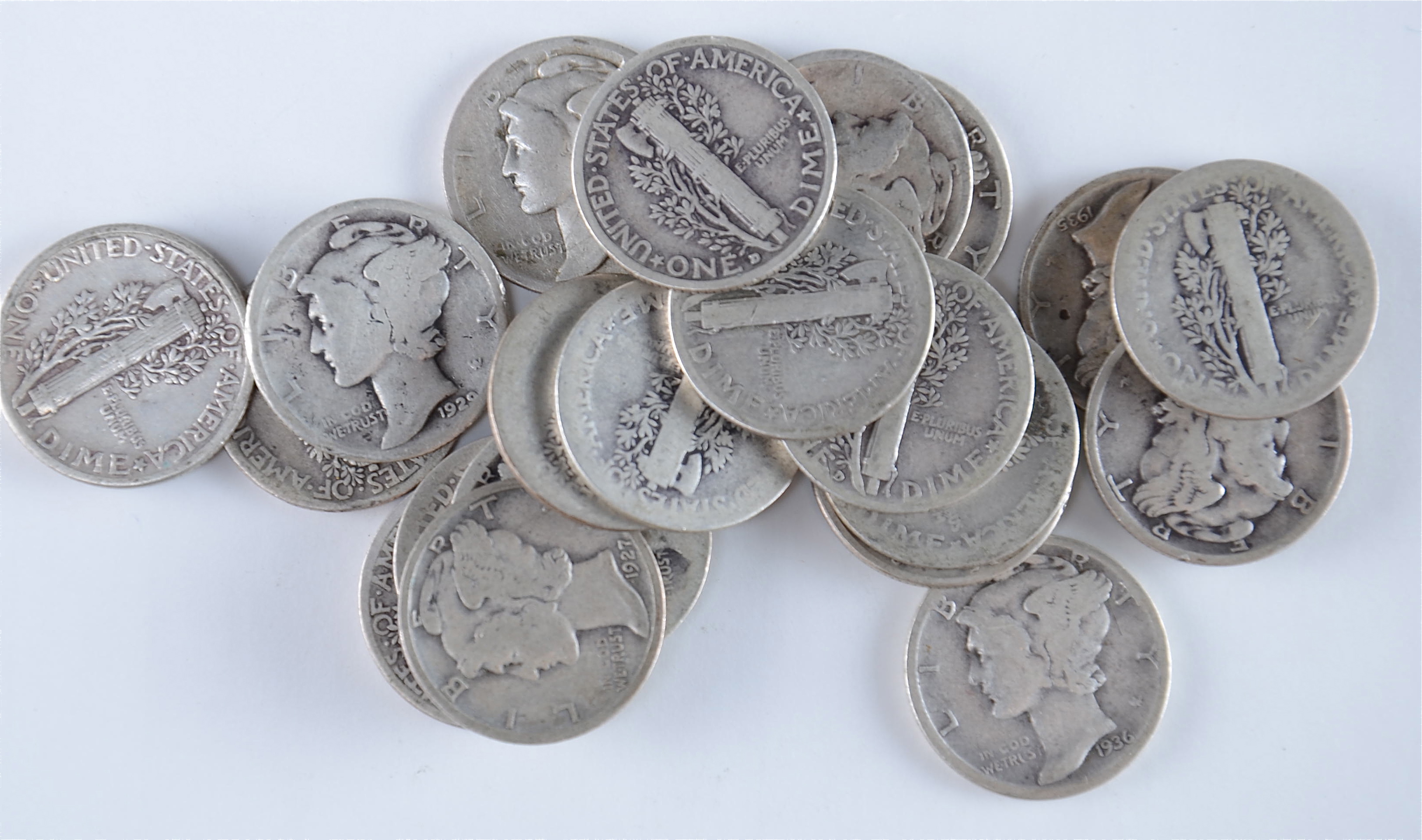 Group of (20) silver Mercury dimes including the following: 1917, 1920, 1923, 1924, 1925, 1926, 1927, 1928, 1929, 1930, 1934, 1934 D, 1935, 1935 D, 1935 S, 1936, 1936 D, 1936 S, 1937, and 1937 D