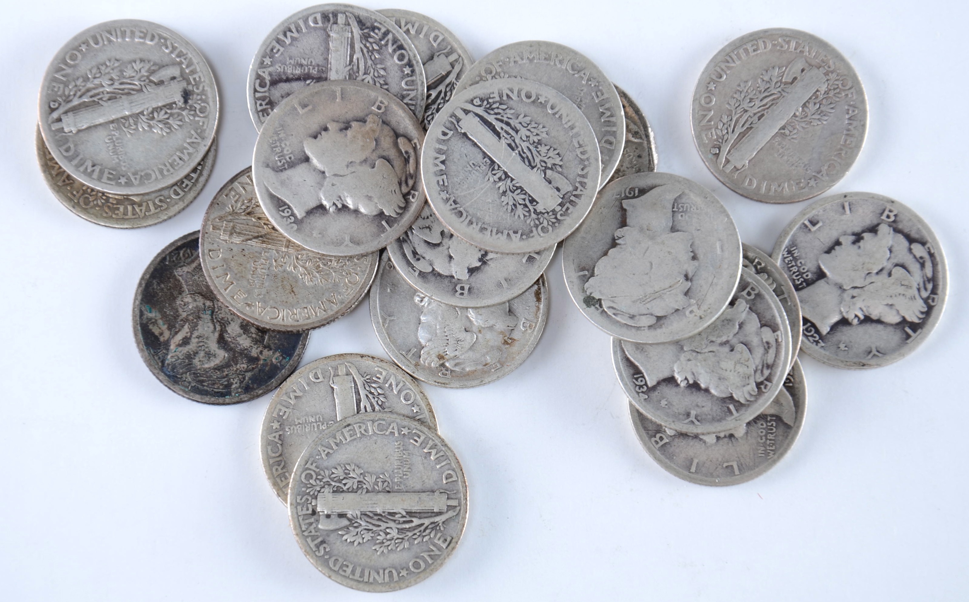 Group of (20) silver Mercury dimes including the following: 1917, 1920, 1923, 1924, 1925, 1926, 1927, 1928, 1929, 1930, 1934, 1934 D, 1935, 1935 D, 1935 S, 1936, 1936 D, 1936 S, 1937, and 1937 D