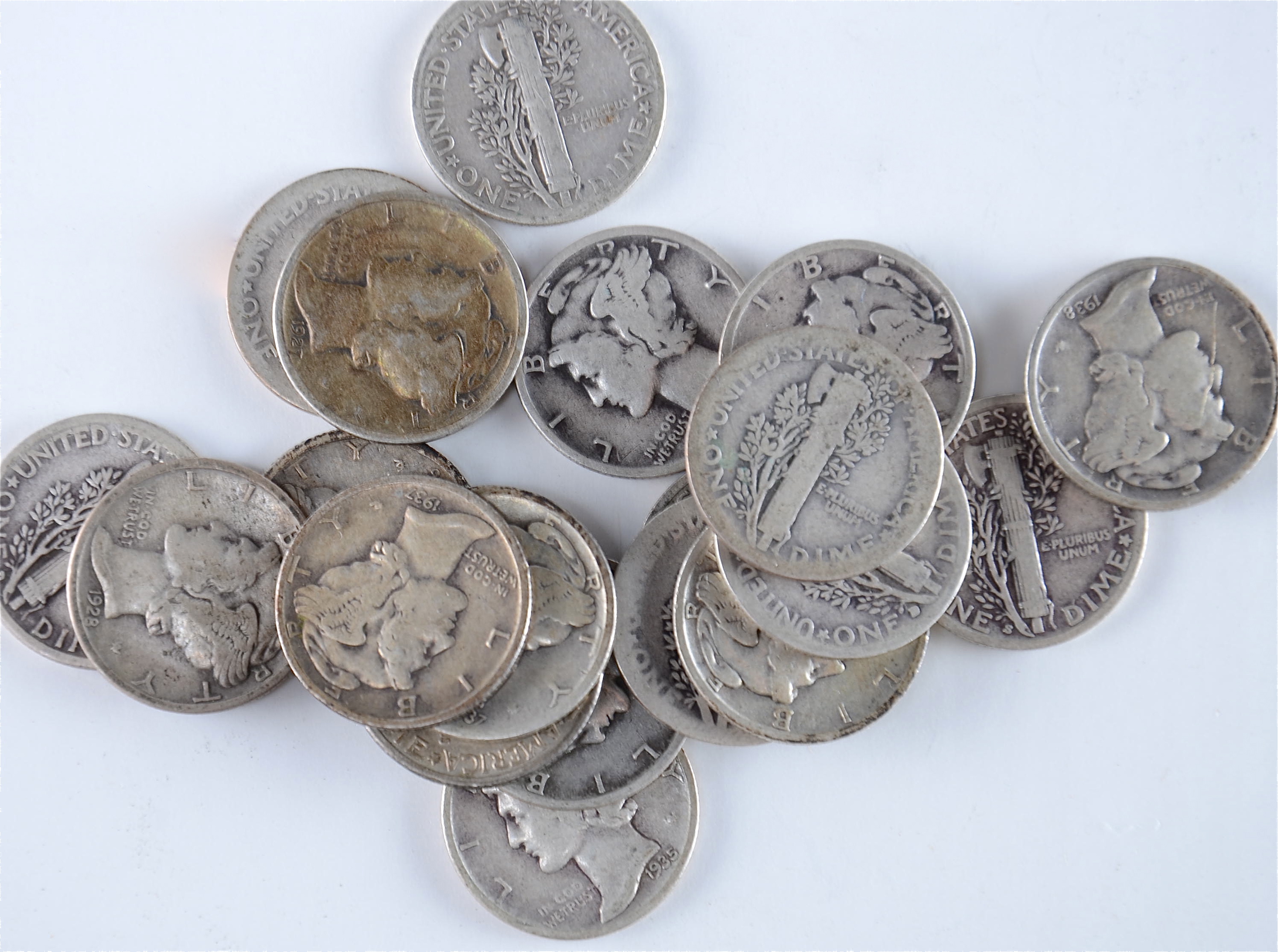 Group of (20) silver Mercury dimes including the following: 1917, 1920, 1923, 1927, 1928, 1929, 1934, 1934 D, 1935, 1935 D, 1935 S, 1936, 1936 D, 1936 S, 1937, 1937 D, 1937 S, 1938, 1938 D, and 1938 S