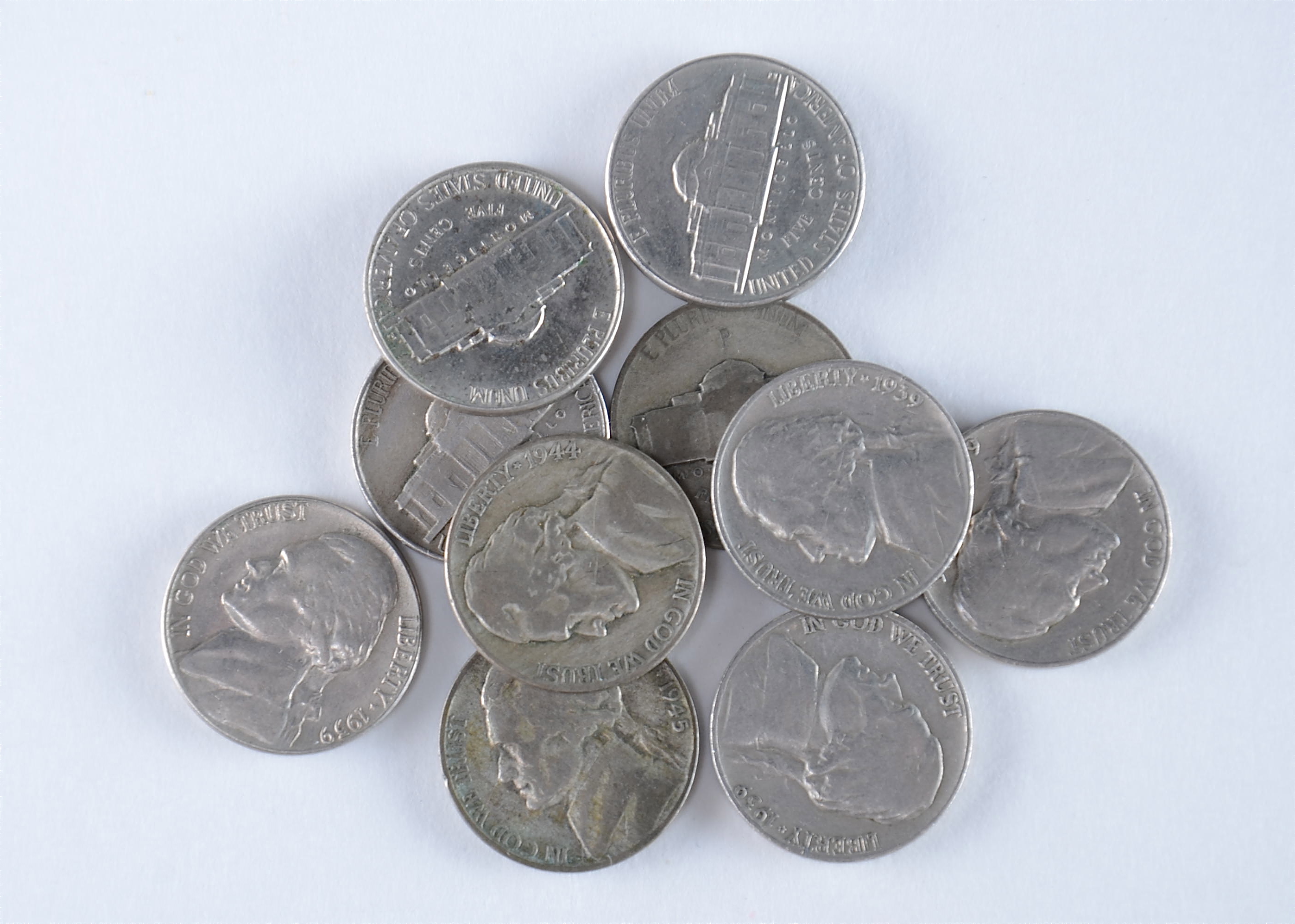 Group of (10) Jefferson nickels including (3) wartime silver nickels. Includes the following: (3) 1939, 1943 P, 1944 P, and 1945 P, 1947, 1956 D, 1957 D, and 1959 D