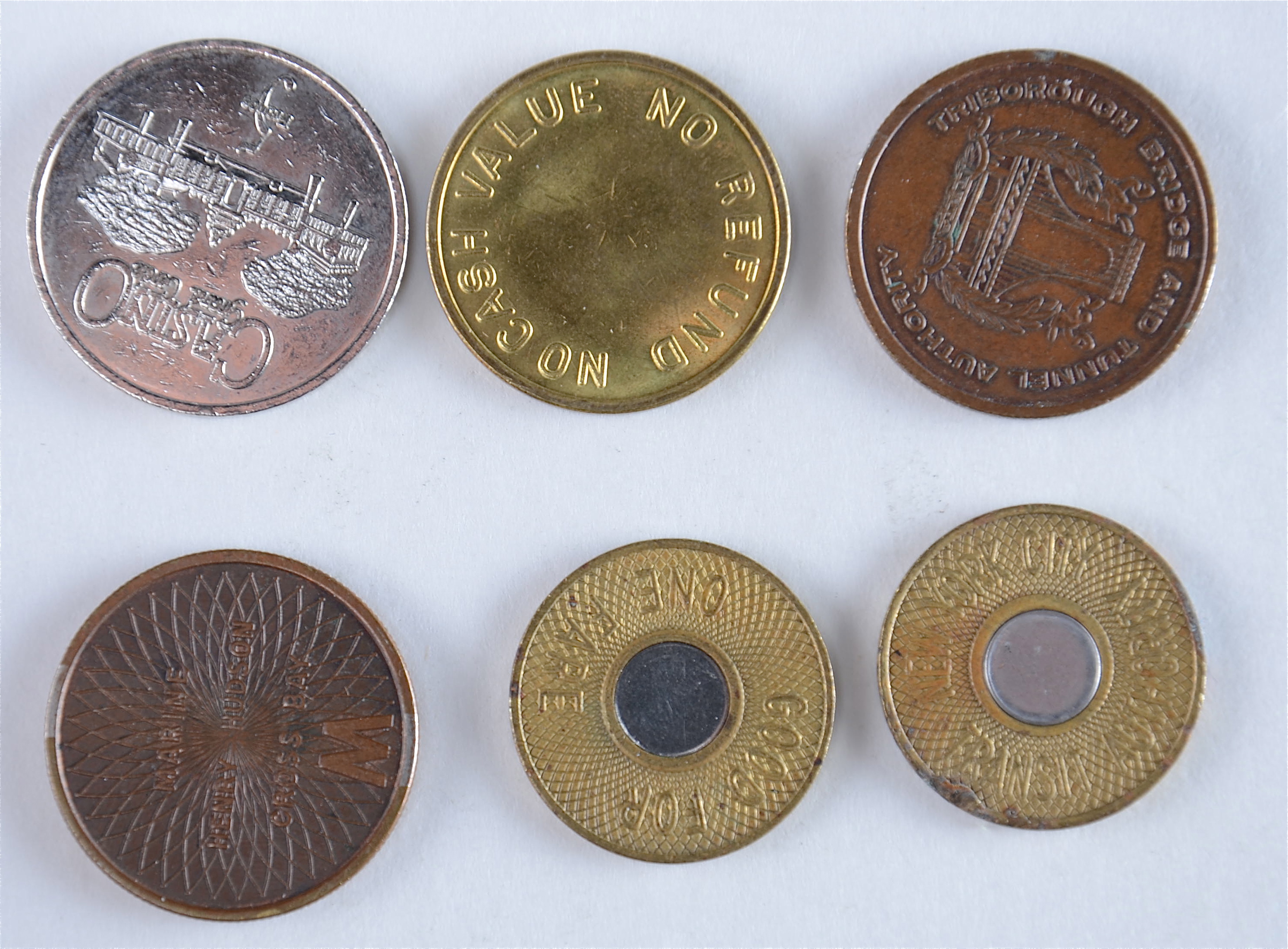 Group of six vintage tokens