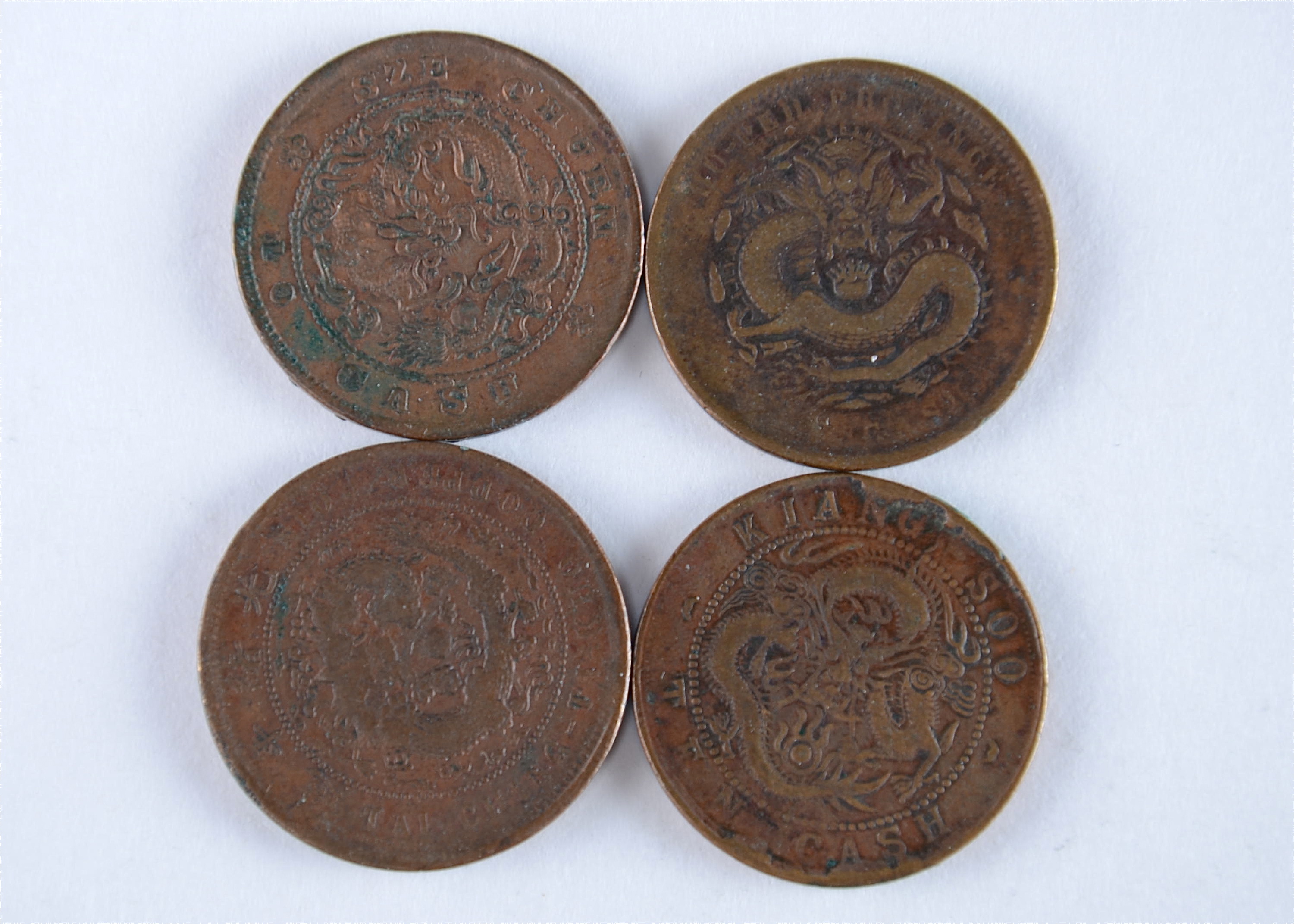 Group of (4) older Chinese copper coins