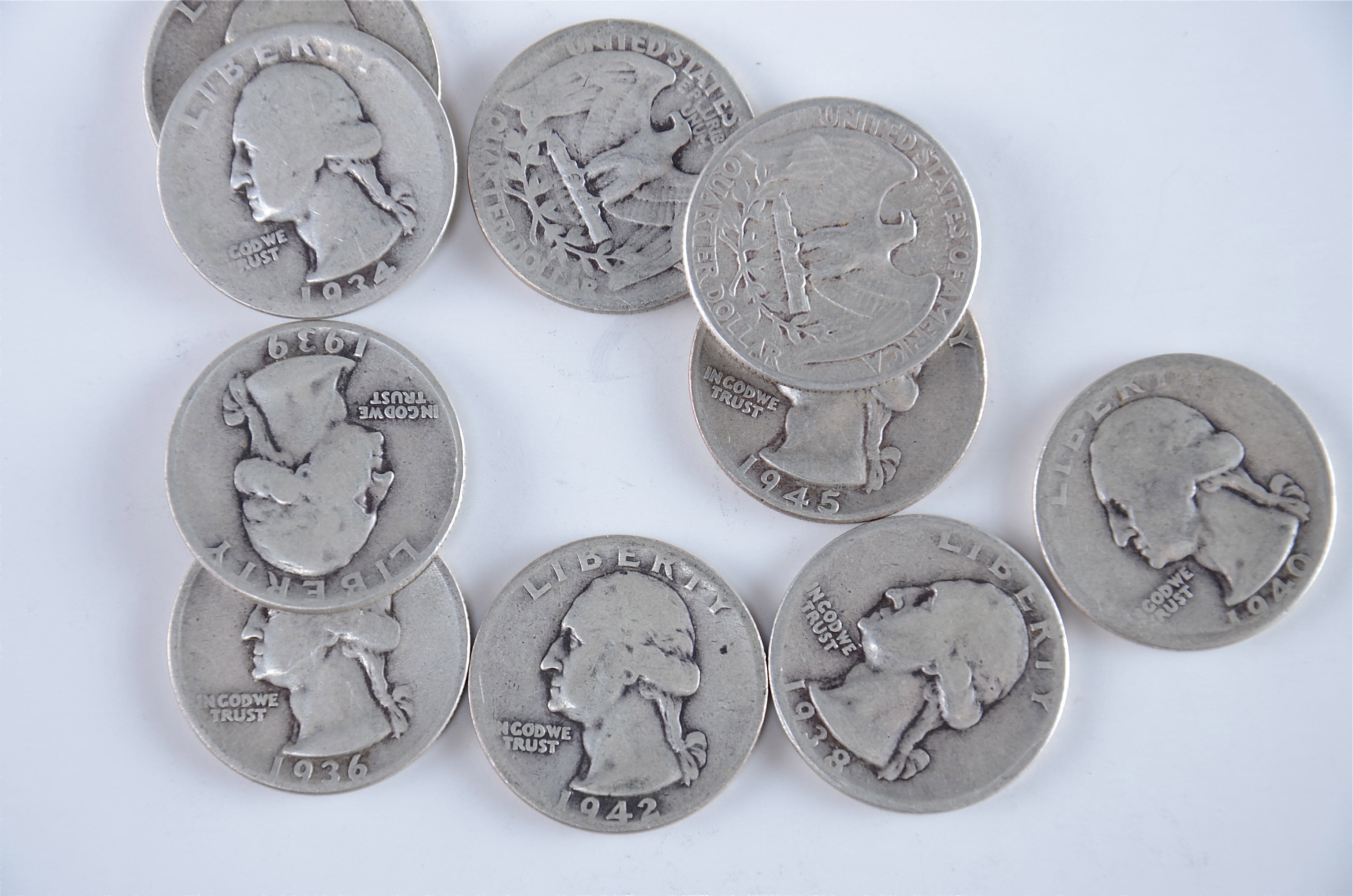 Group of (10) silver Washington quarters including the following: 1934, 1936, 1938, 1939, 1940, 1942, 1942 D, 1943, 1944, and 1945