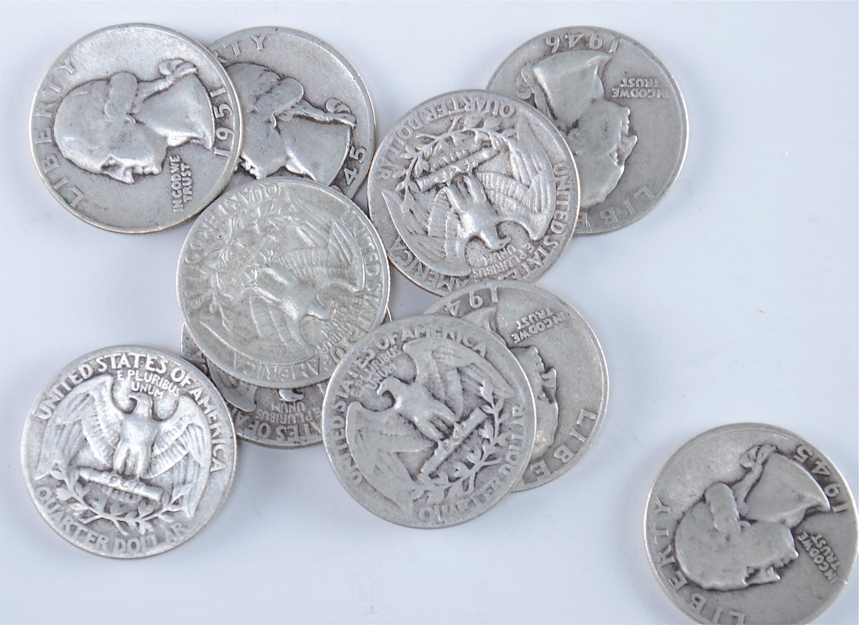 Group of (10) silver Washington quarters including the following: 1942, 1943, 1945, 1945 D, 1945 S, 1946, 1947, 1949, 1950 D, and 1951 D