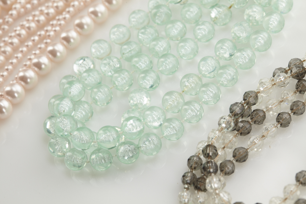 Lot of costume jewelry and dainty floral dresser tray