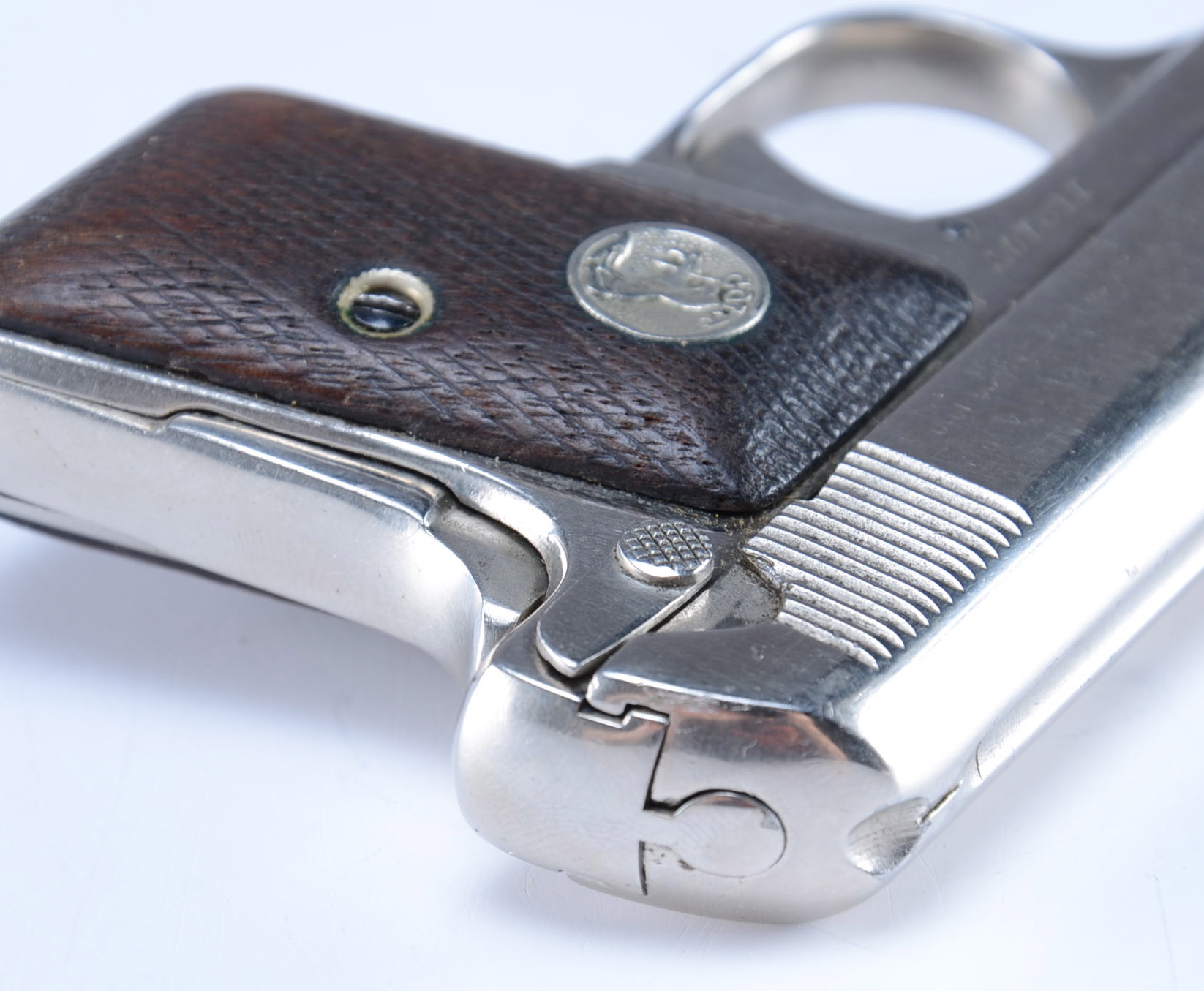 COLT Automatic - Nickel Plated .25 Calibre Hamerless Semi-Auto Pistol