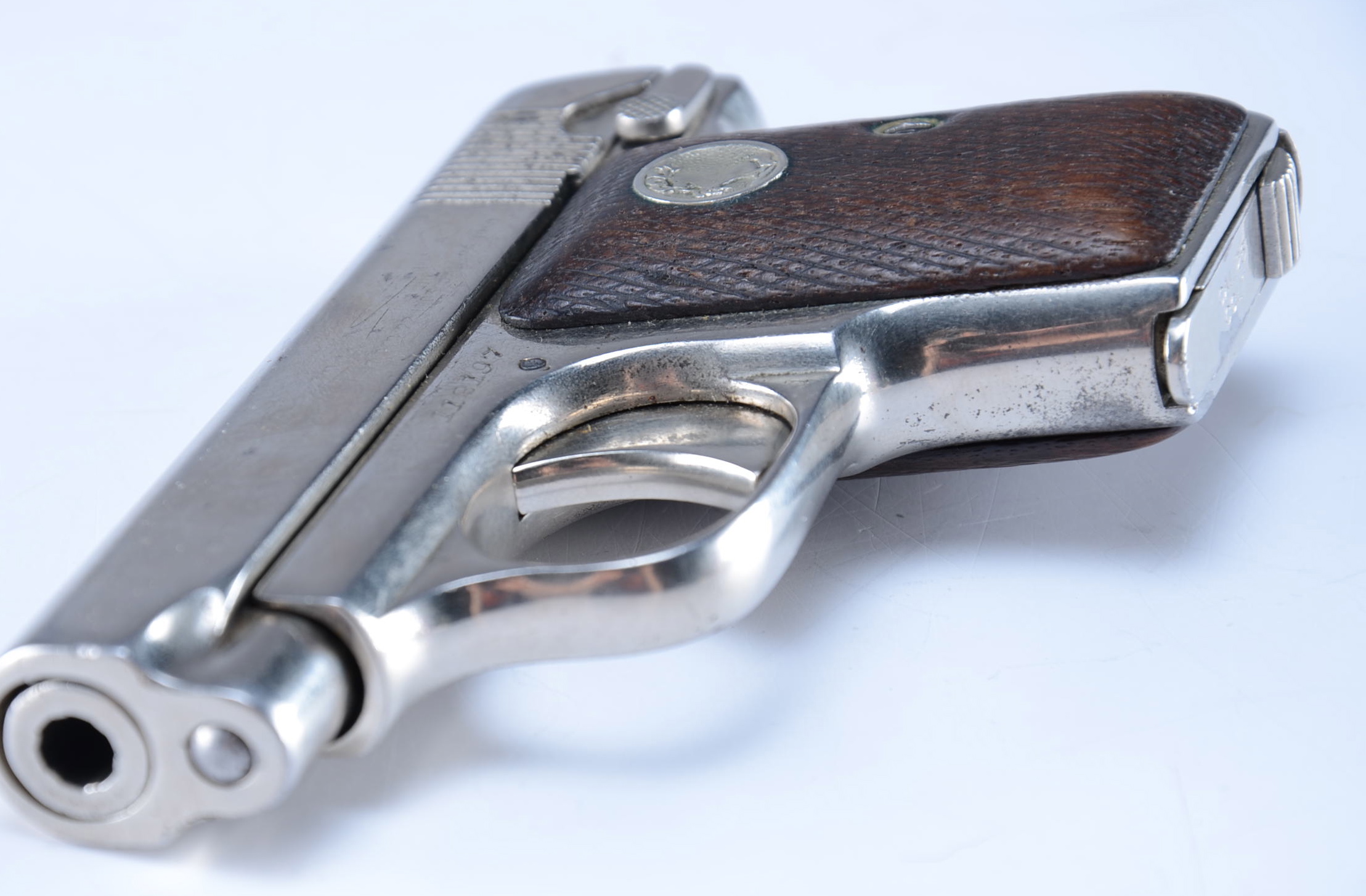 COLT Automatic - Nickel Plated .25 Calibre Hamerless Semi-Auto Pistol