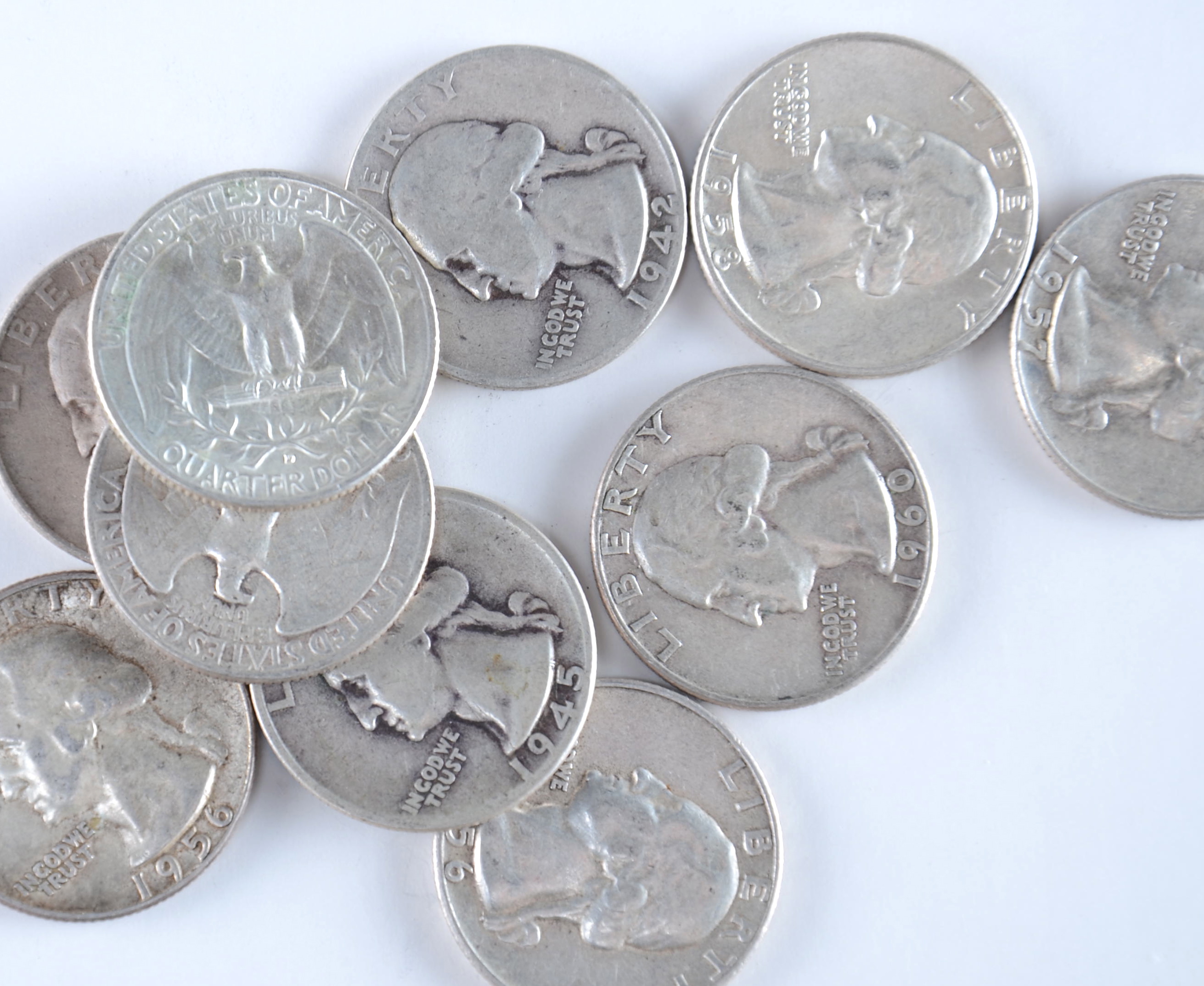 Group of (10) silver Washington quarters including the following: 1942, 1945, 1953 D, 1956, 1957, 1957 D, 1958 D, 1959 D, and 1960 D
