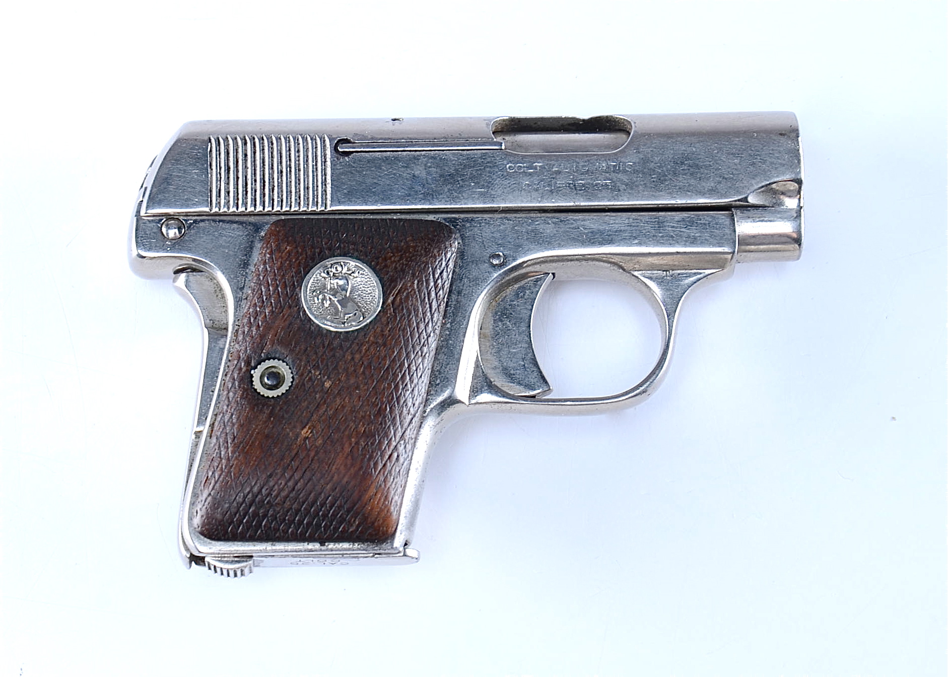 COLT Automatic - Nickel Plated .25 Calibre Hamerless Semi-Auto Pistol
