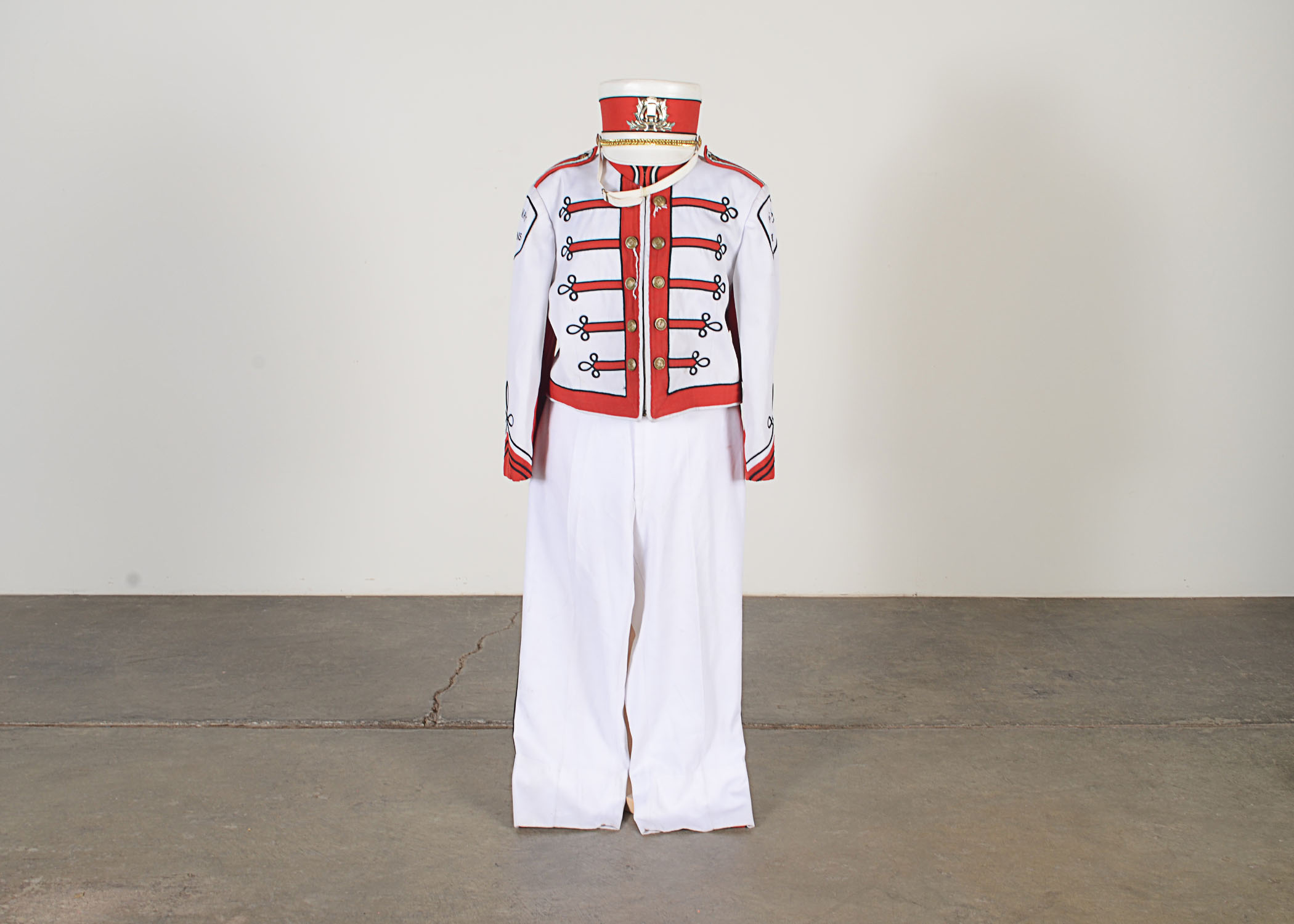 Vintage Muskegon Big Red Band uniform with coordinating hat