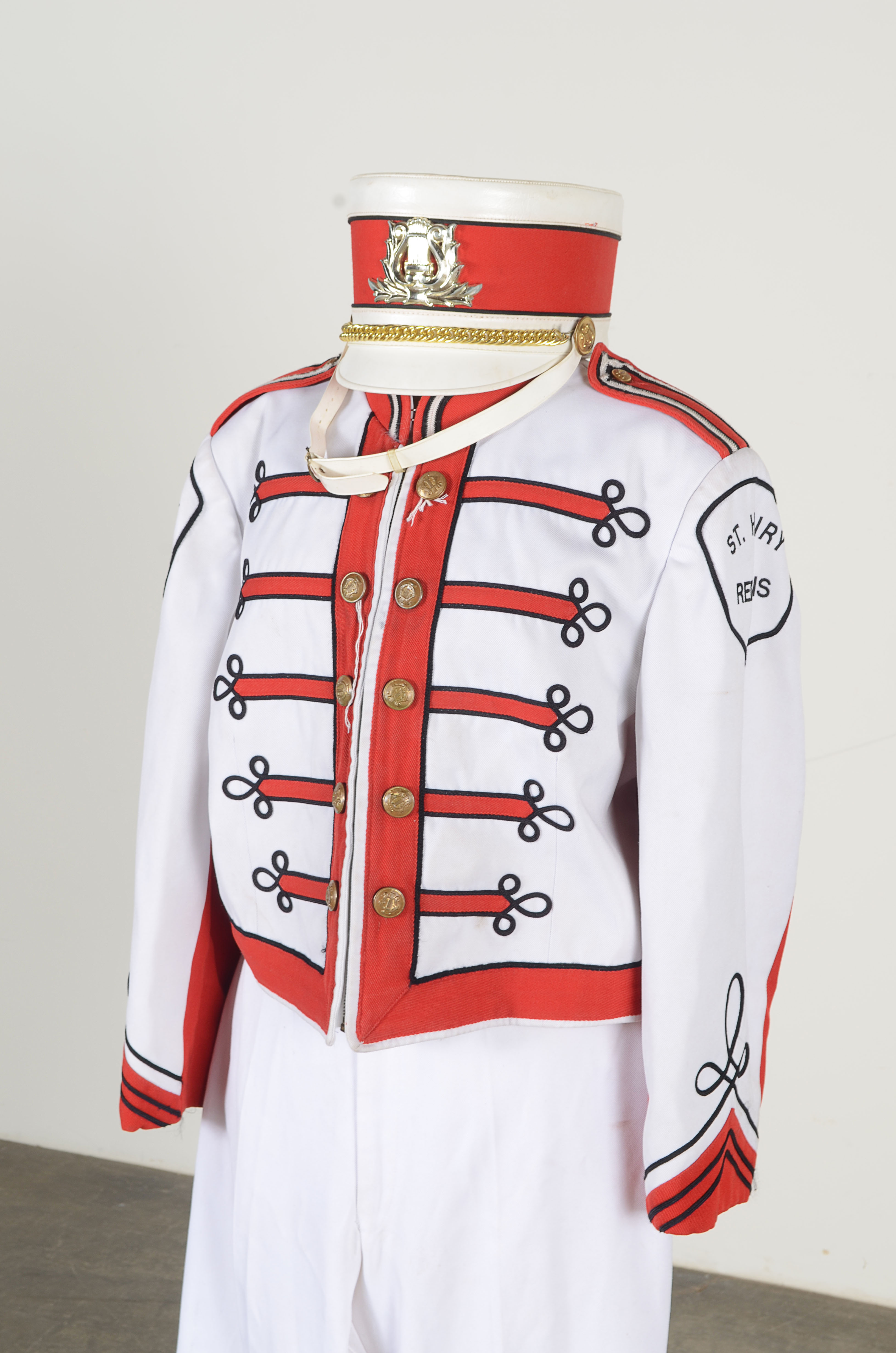 Vintage Muskegon Big Red Band uniform with coordinating hat