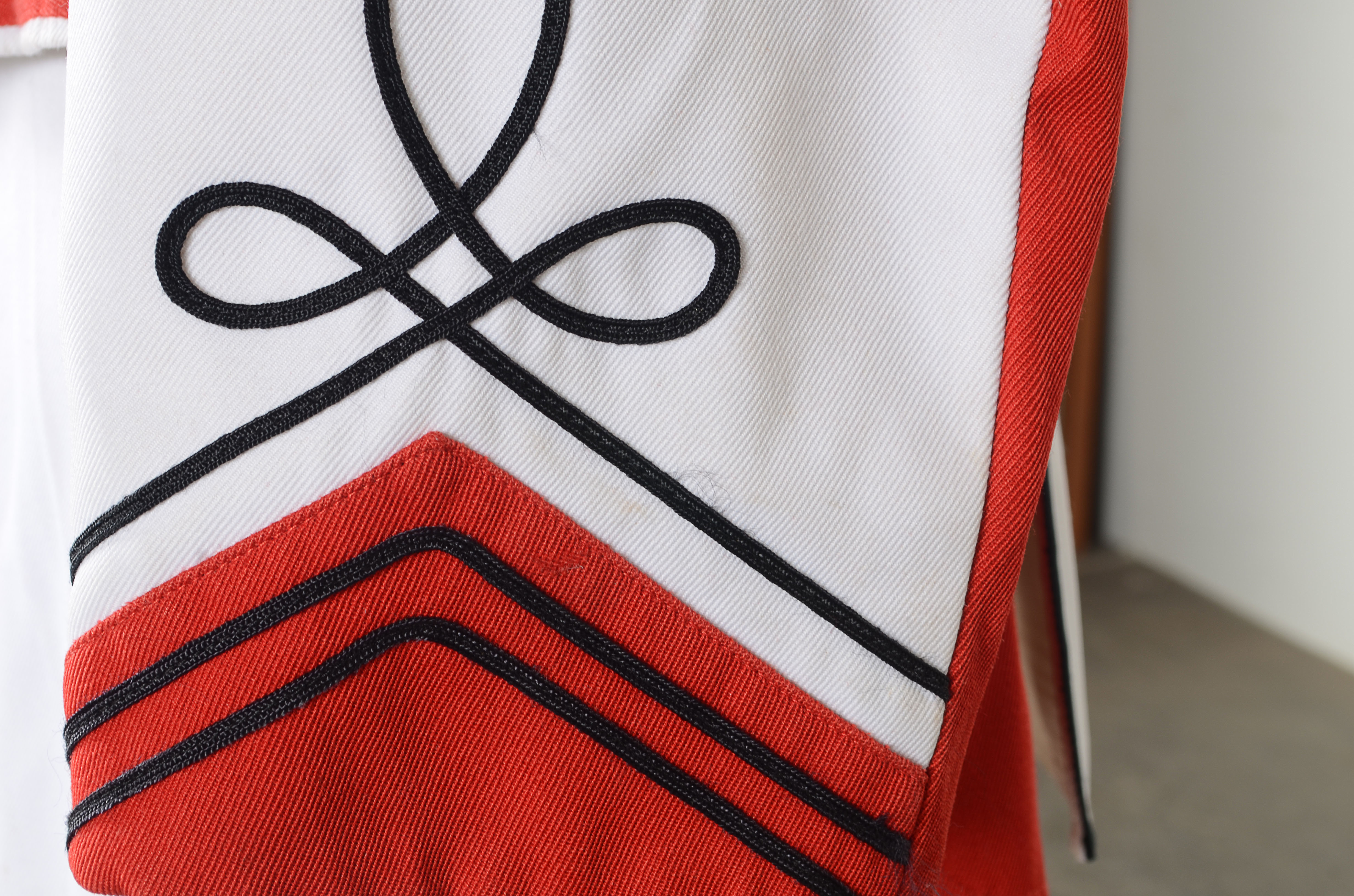 Vintage Muskegon Big Red Band uniform with coordinating hat