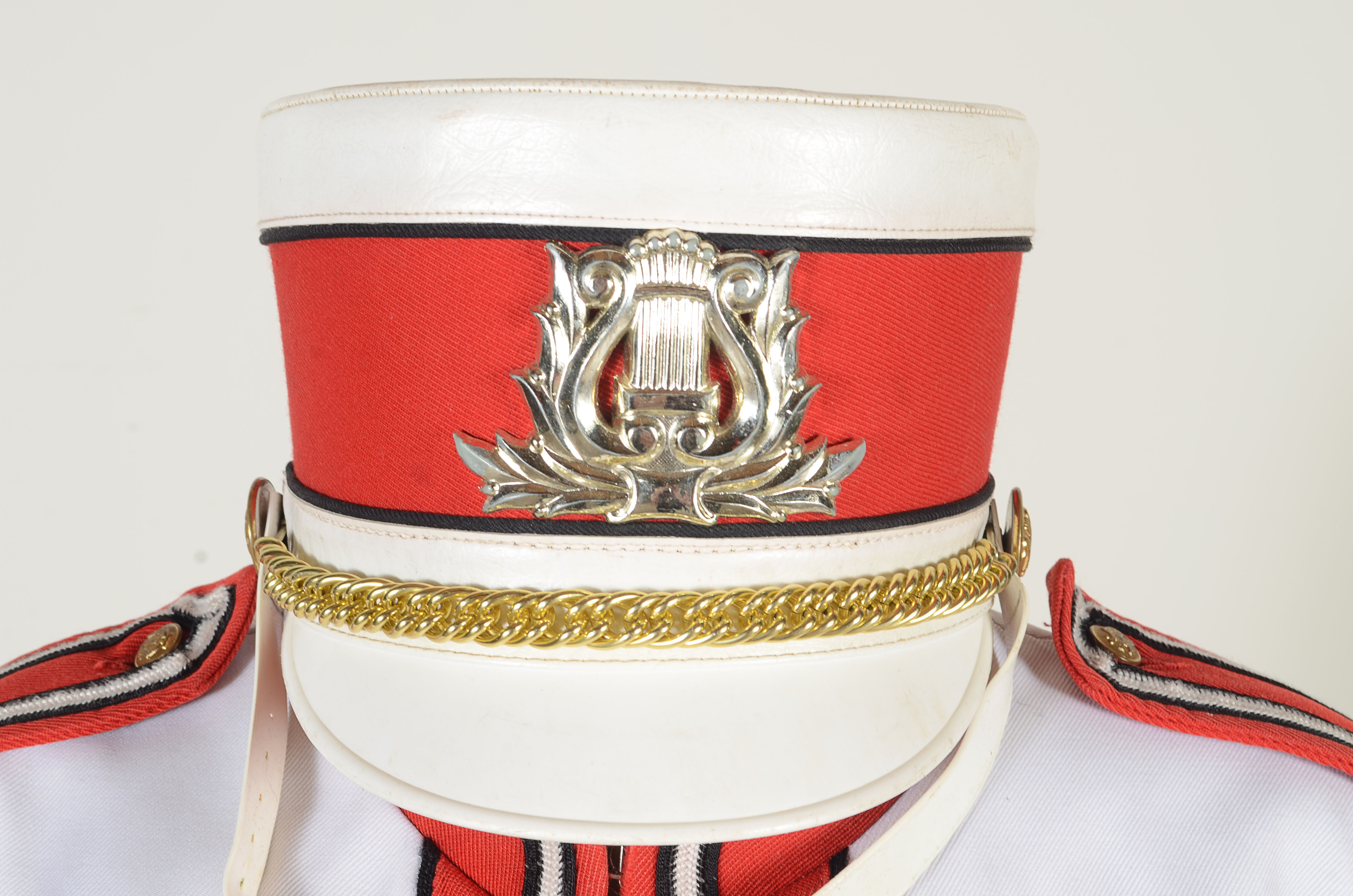 Vintage Muskegon Big Red Band uniform with coordinating hat