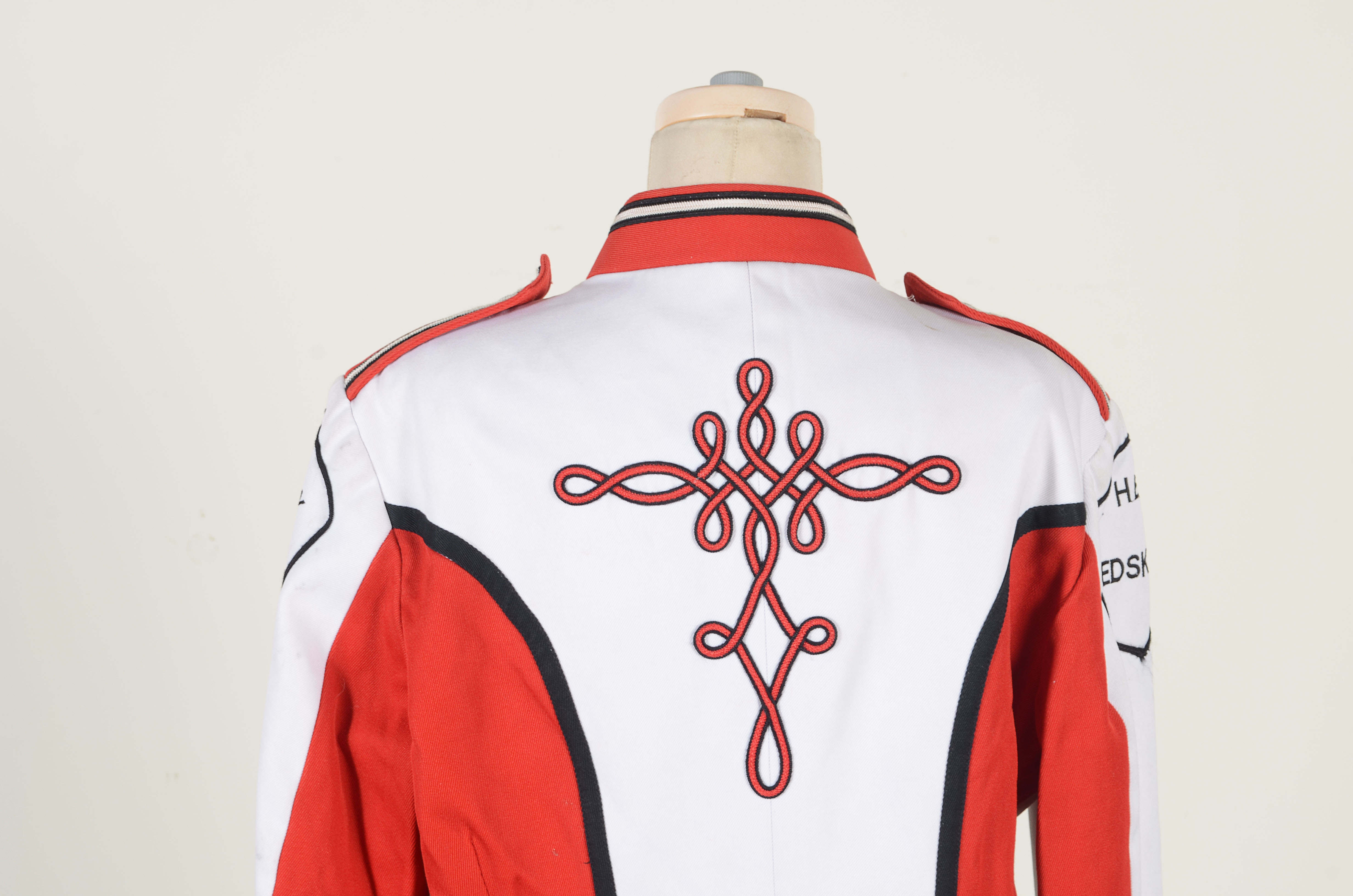 Vintage Muskegon Big Red Band uniform with coordinating hat