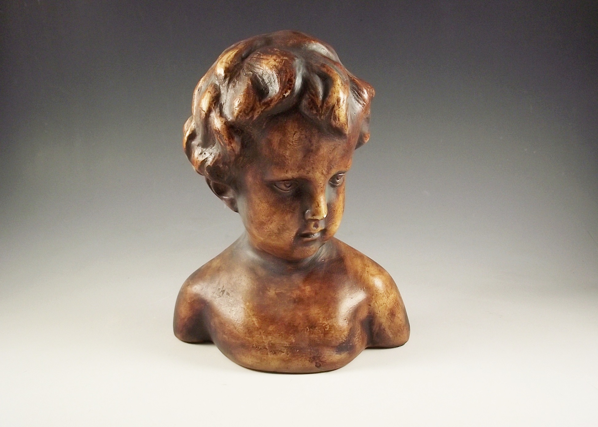 Resin bust of a child.