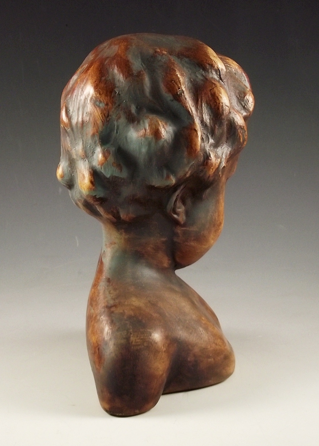 Resin bust of a child.