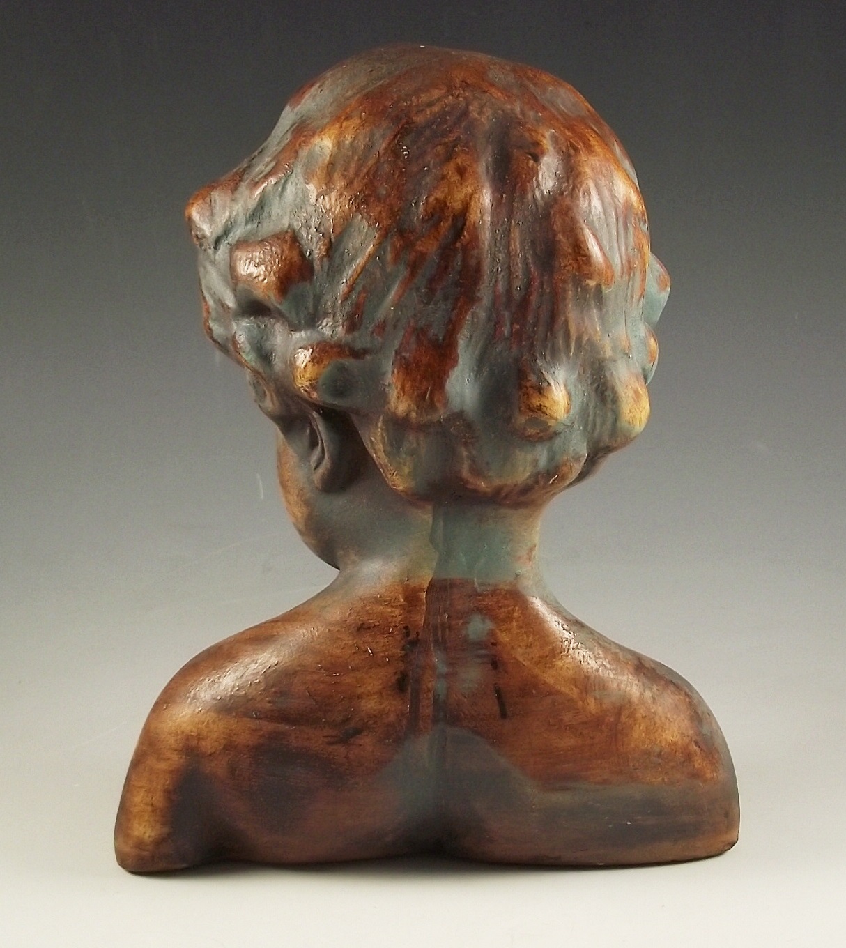 Resin bust of a child.