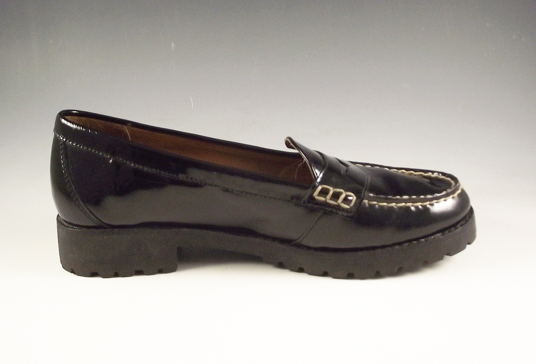 Sperry Top Sider black patent leather penny loafers.