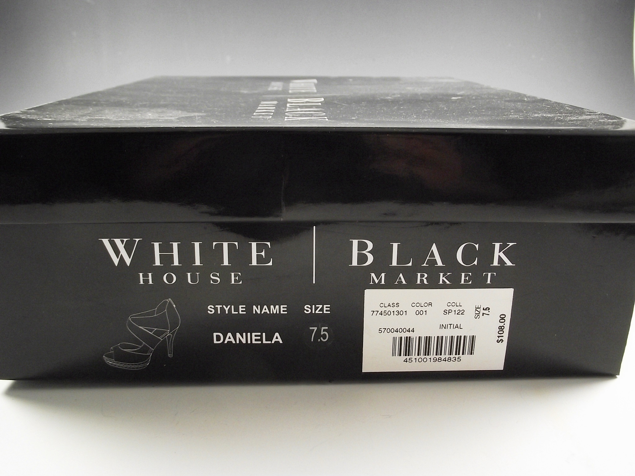 White House/Black Market black and camel leather sandals.