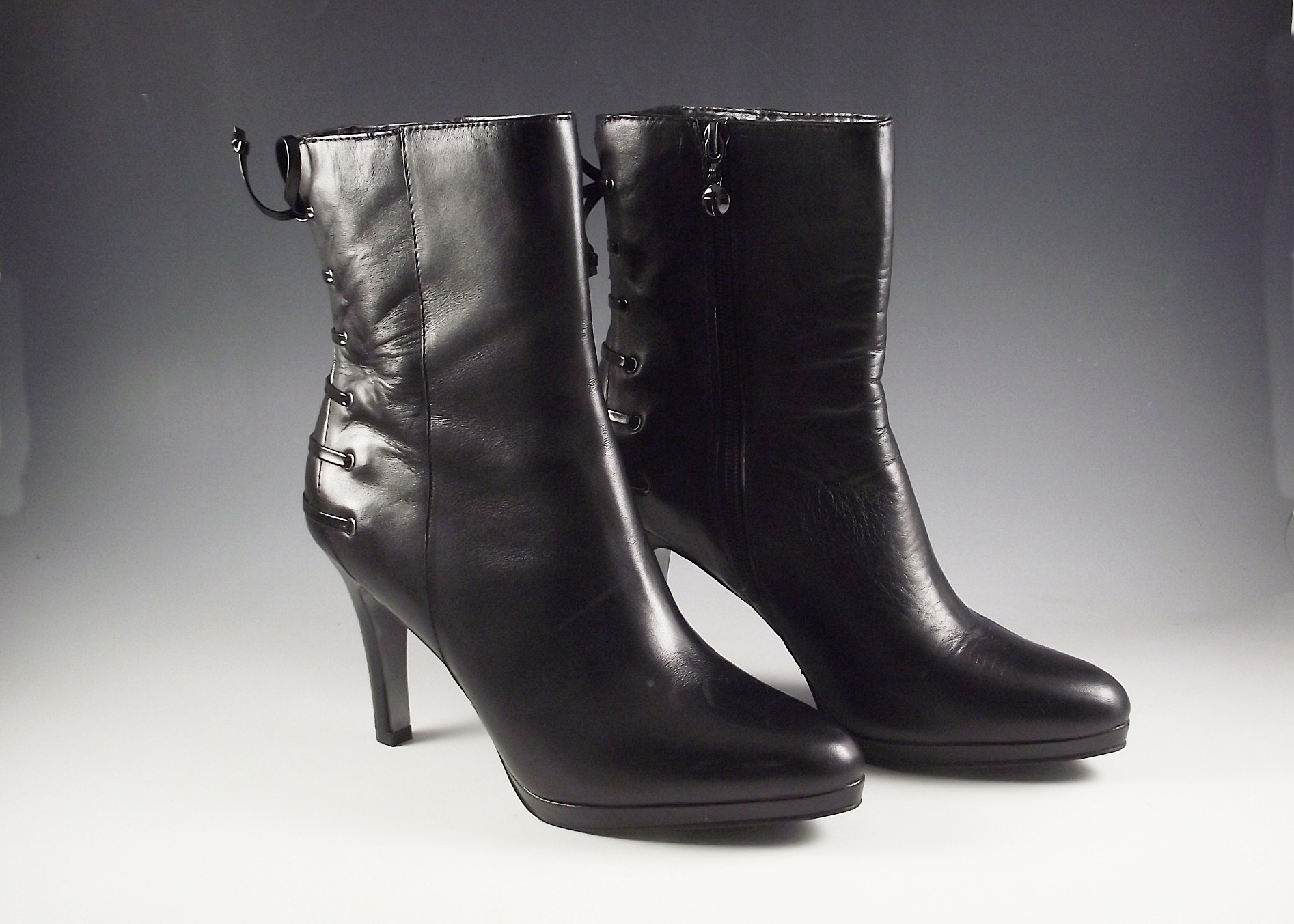 Tahari black leather boots.