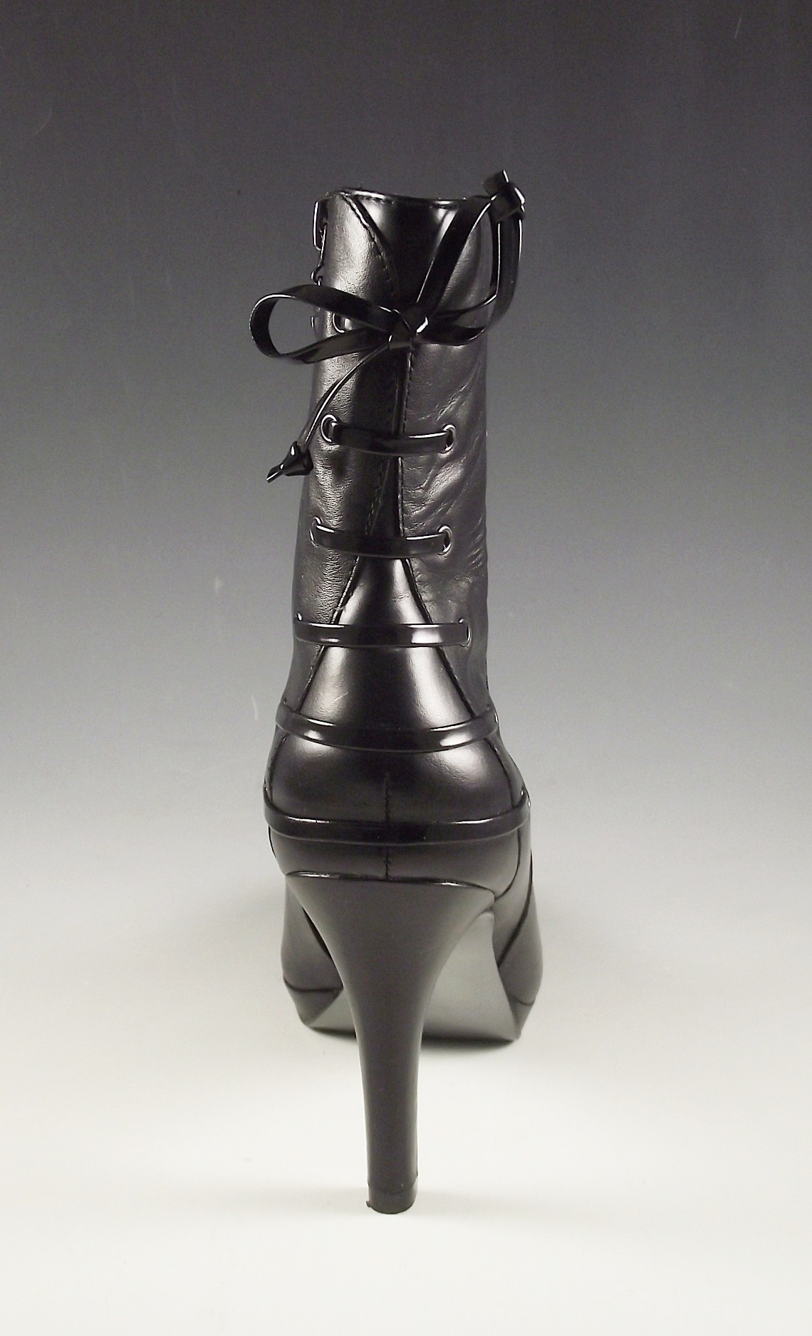 Tahari black leather boots.