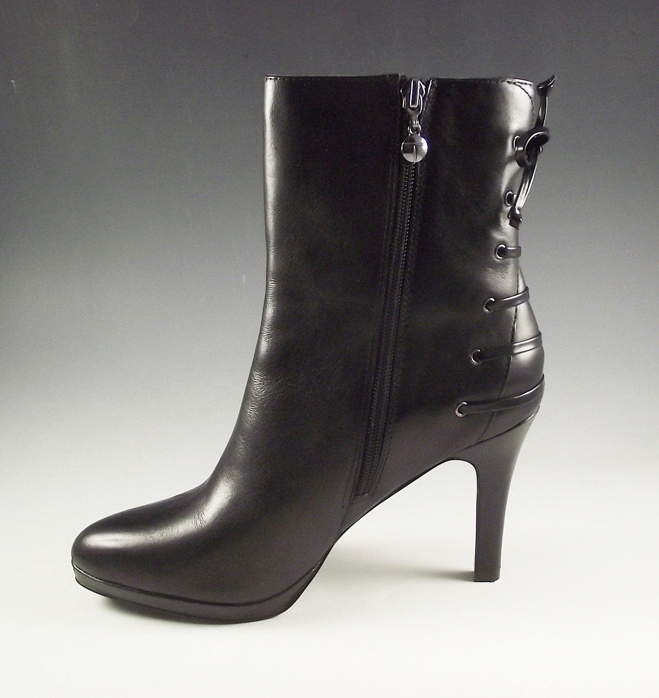 Tahari black leather boots.