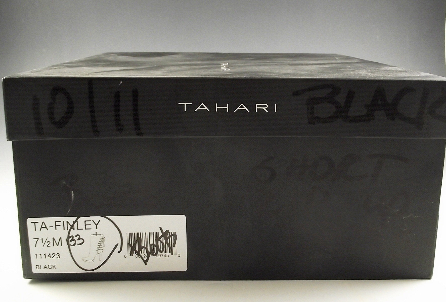 Tahari black leather boots.