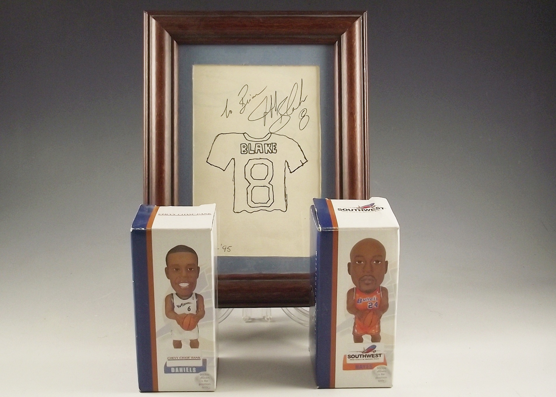 Trio of collectible sports themed items.