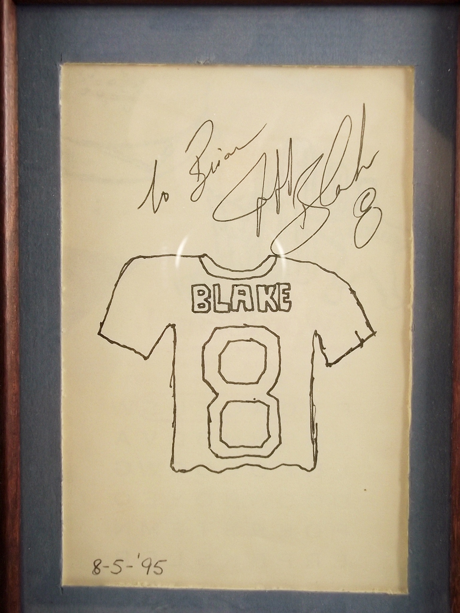 Trio of collectible sports themed items.