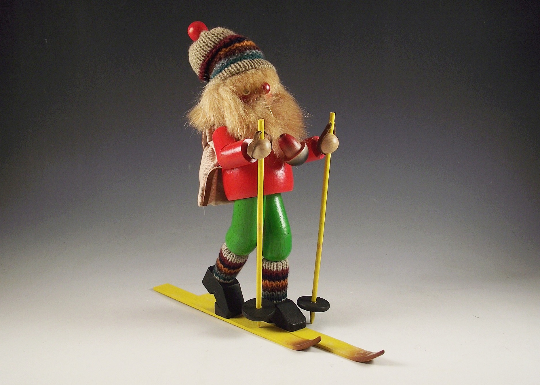 Vintage wooden smoking man.  