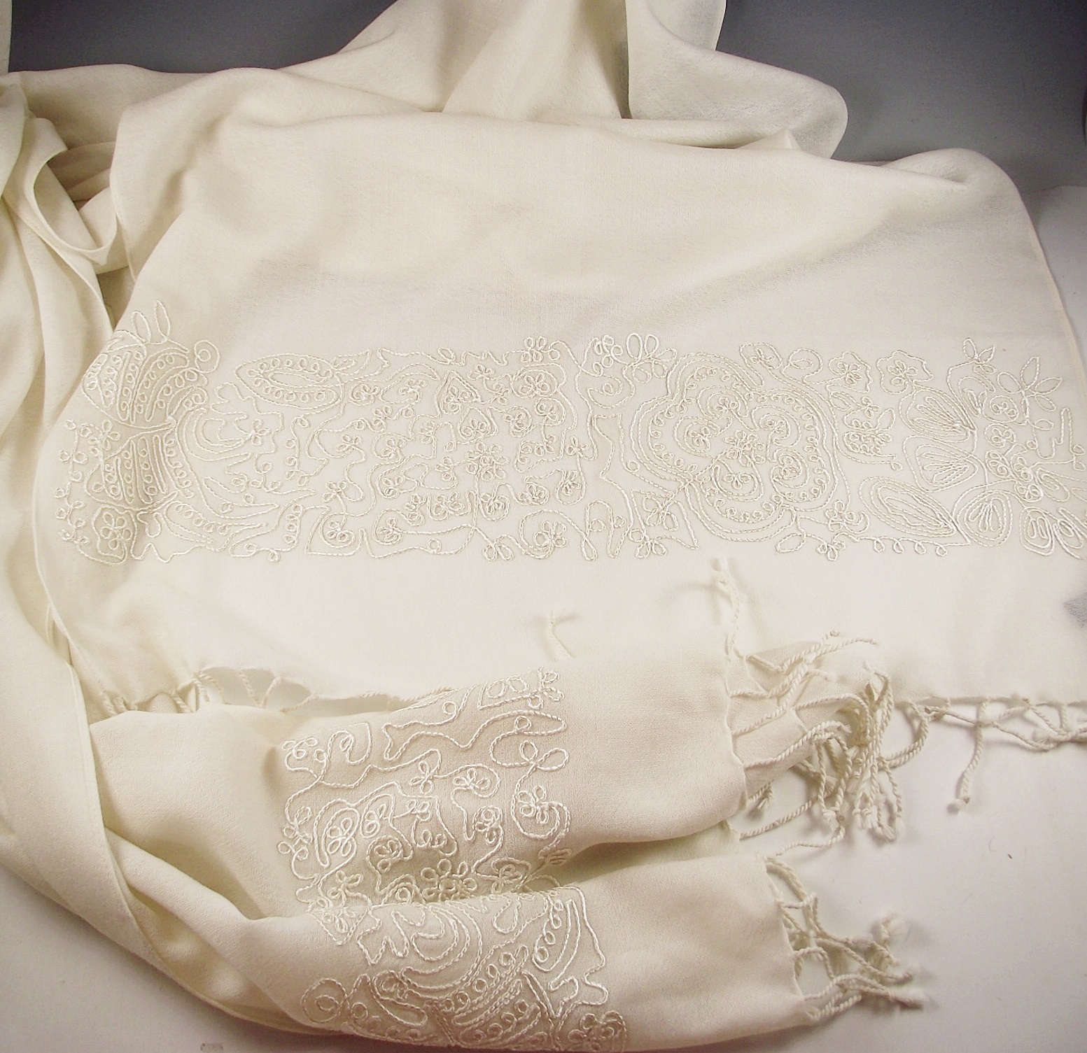 Two designer scarves, one cashmere.