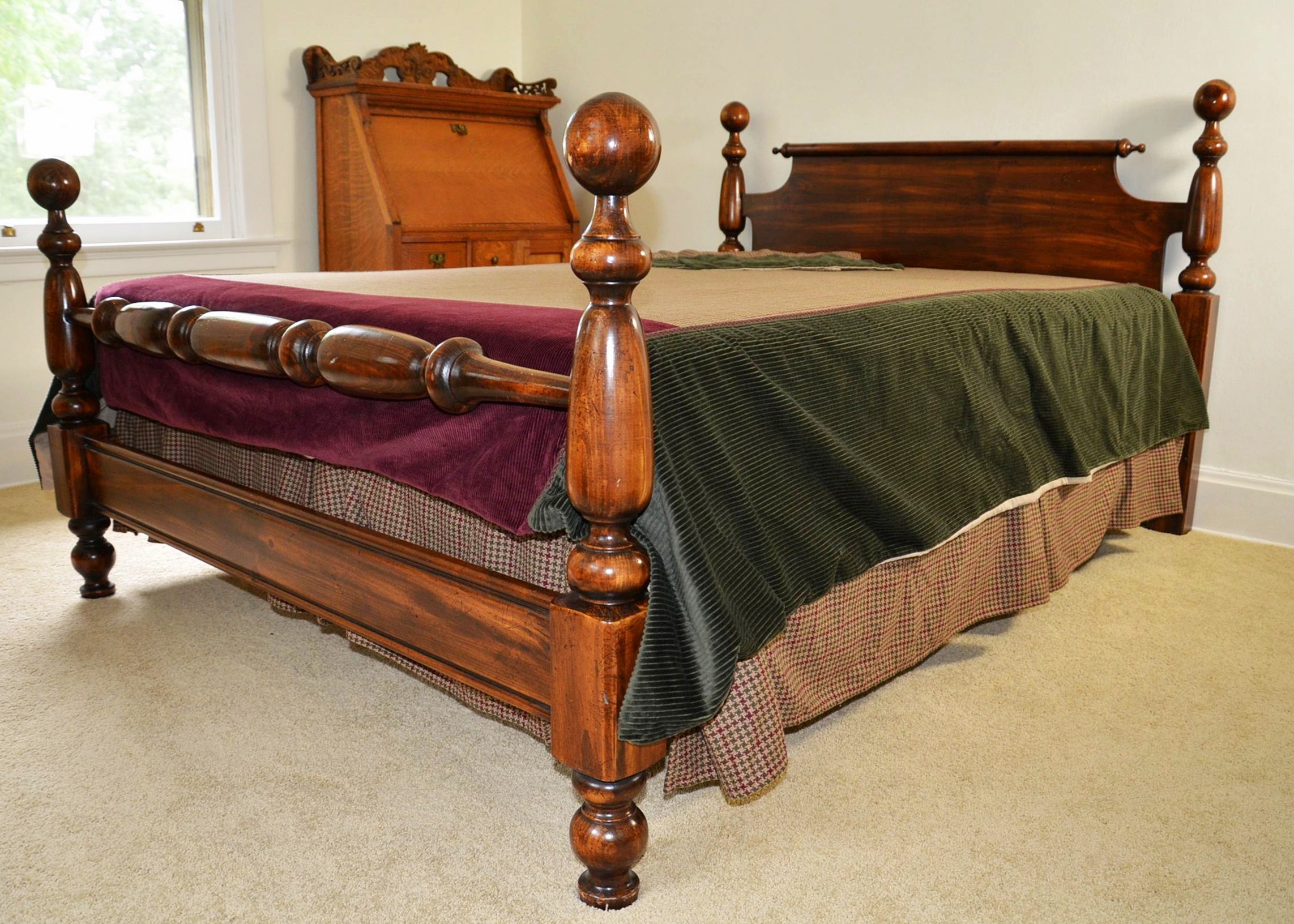 Vintage canon ball four poster bed.
