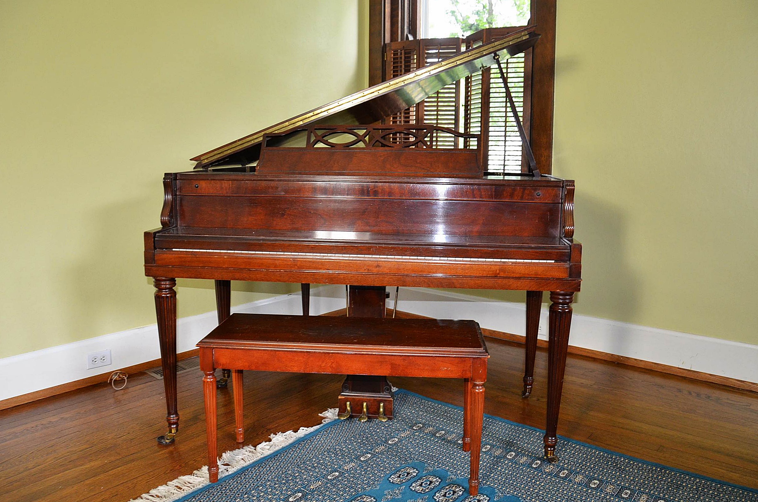 Gulbransen Company mahogany case baby grand piano.