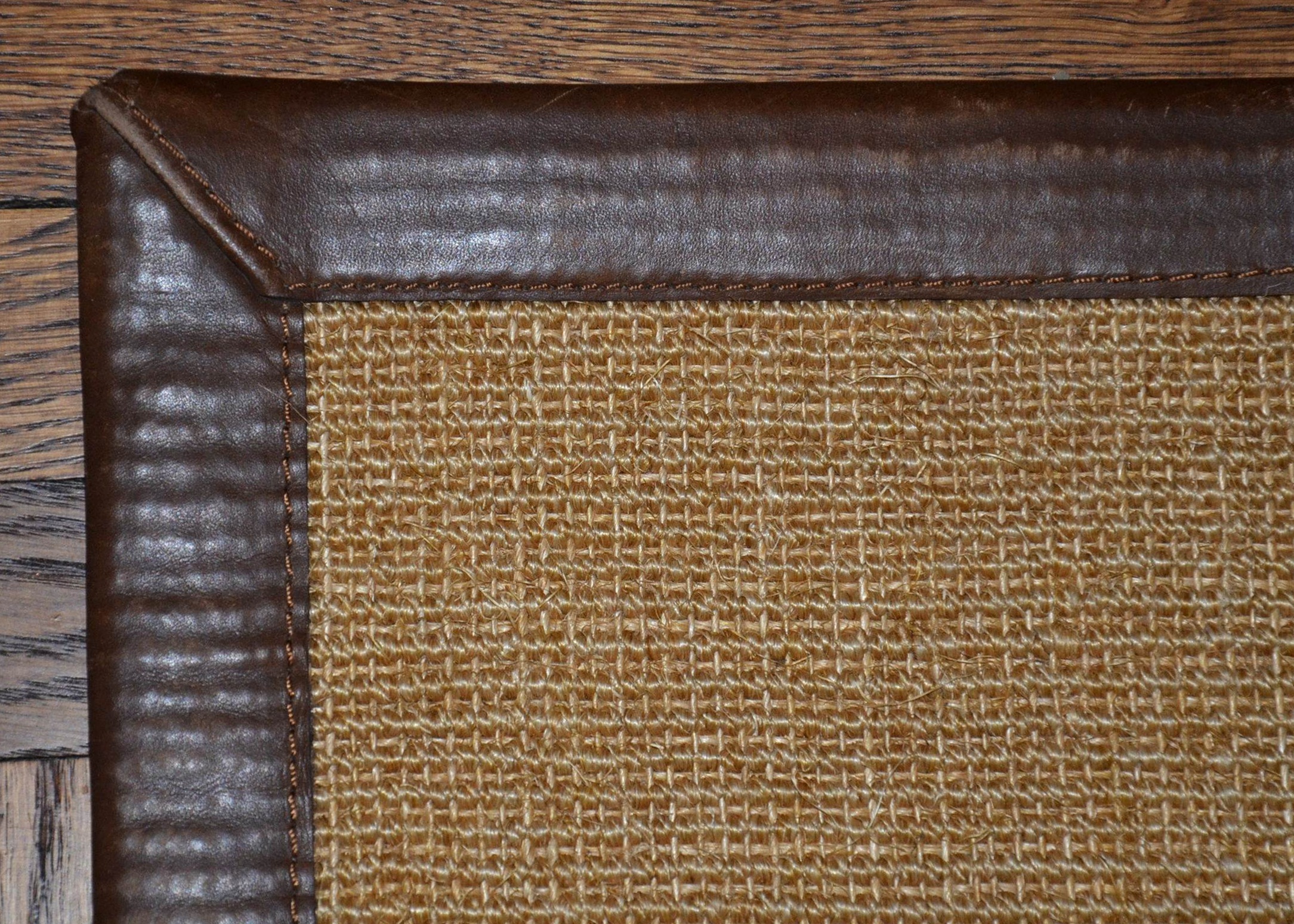 Restoration Hardware sisal rug with leather border.