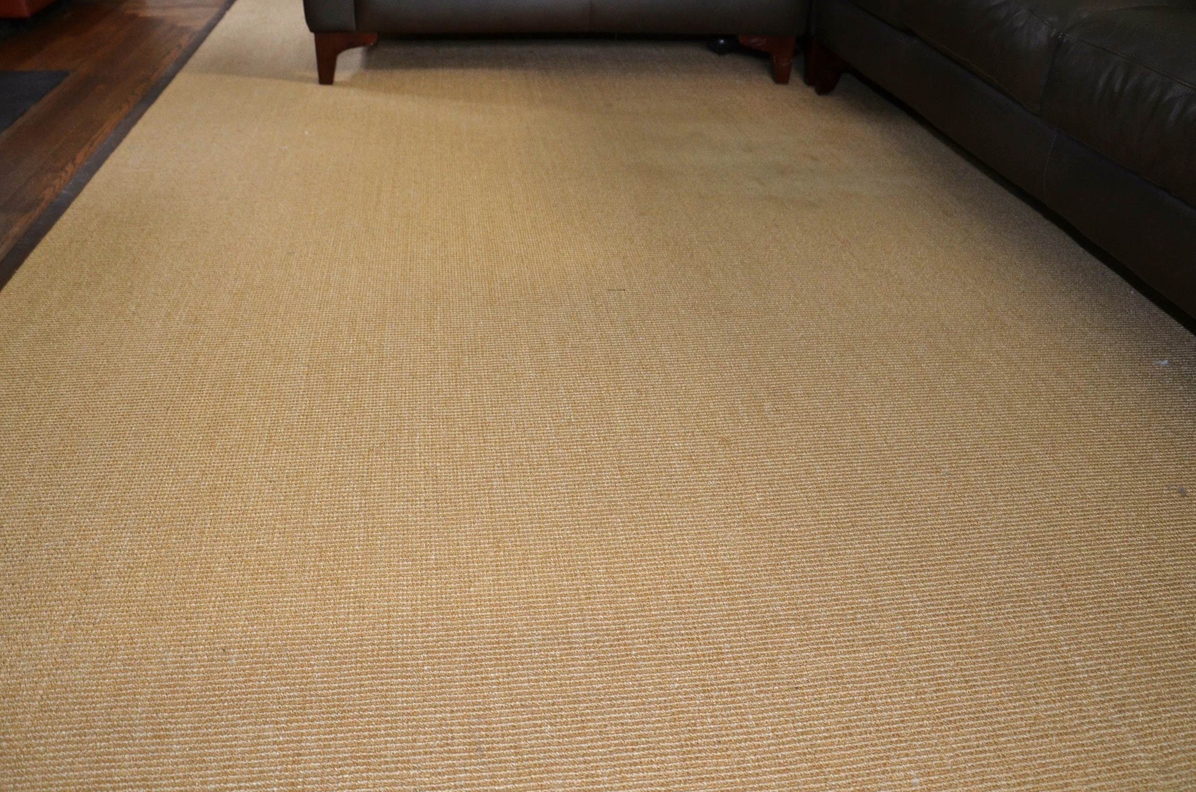 Restoration Hardware sisal rug with leather border.