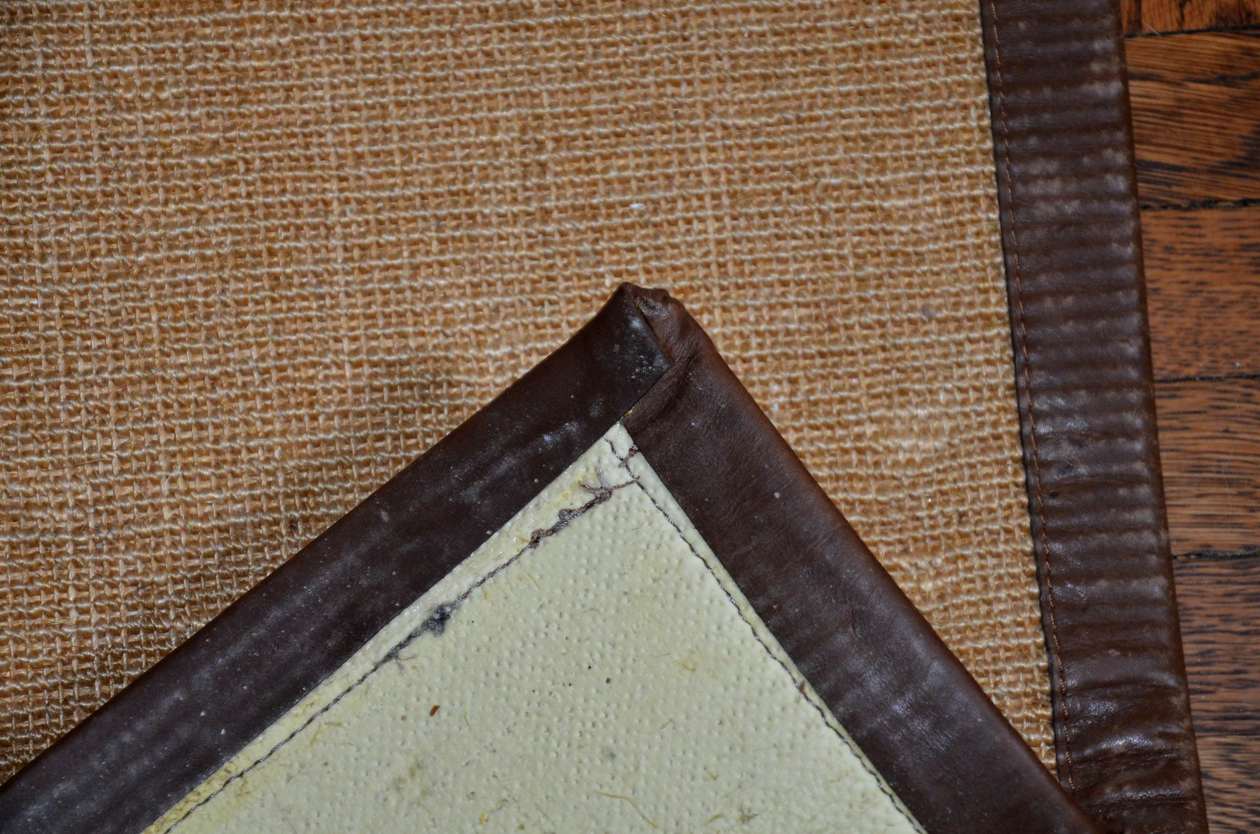 Restoration Hardware sisal rug with leather border.