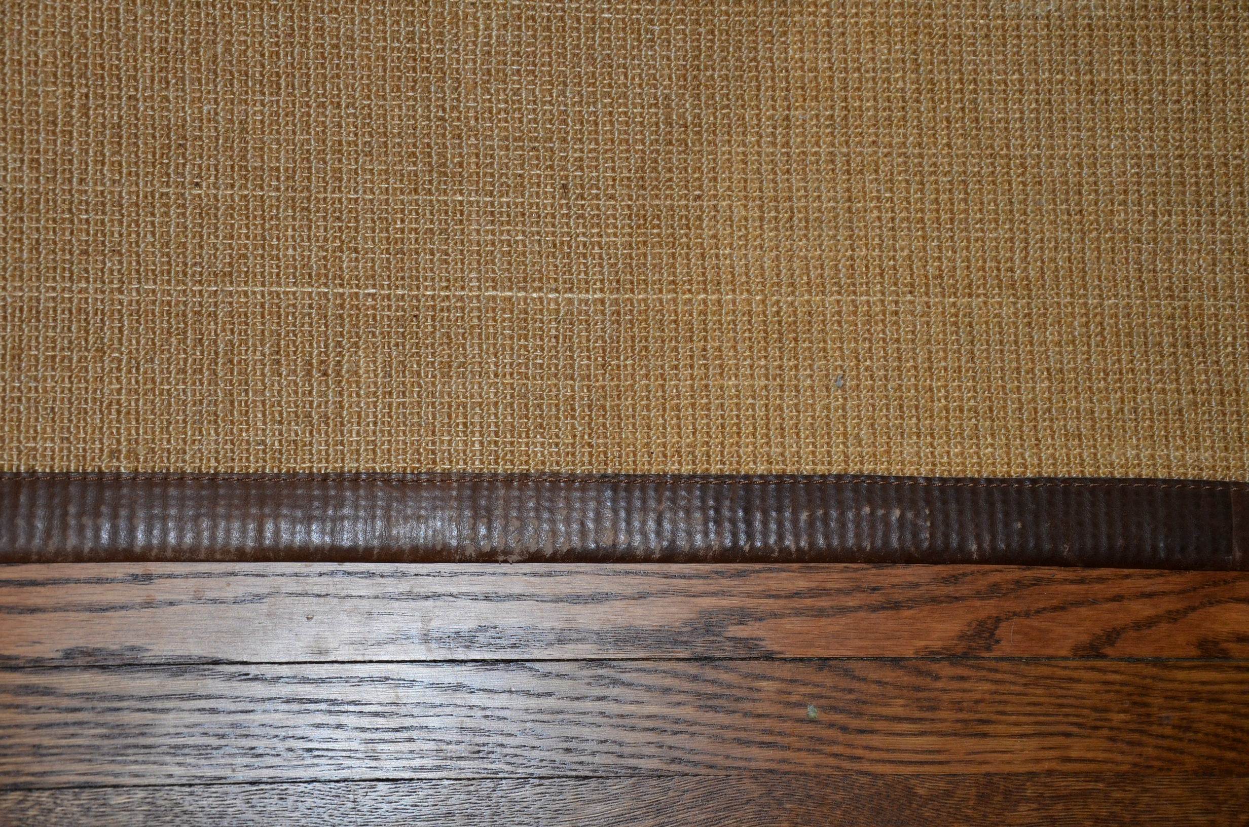Restoration Hardware sisal rug with leather border.