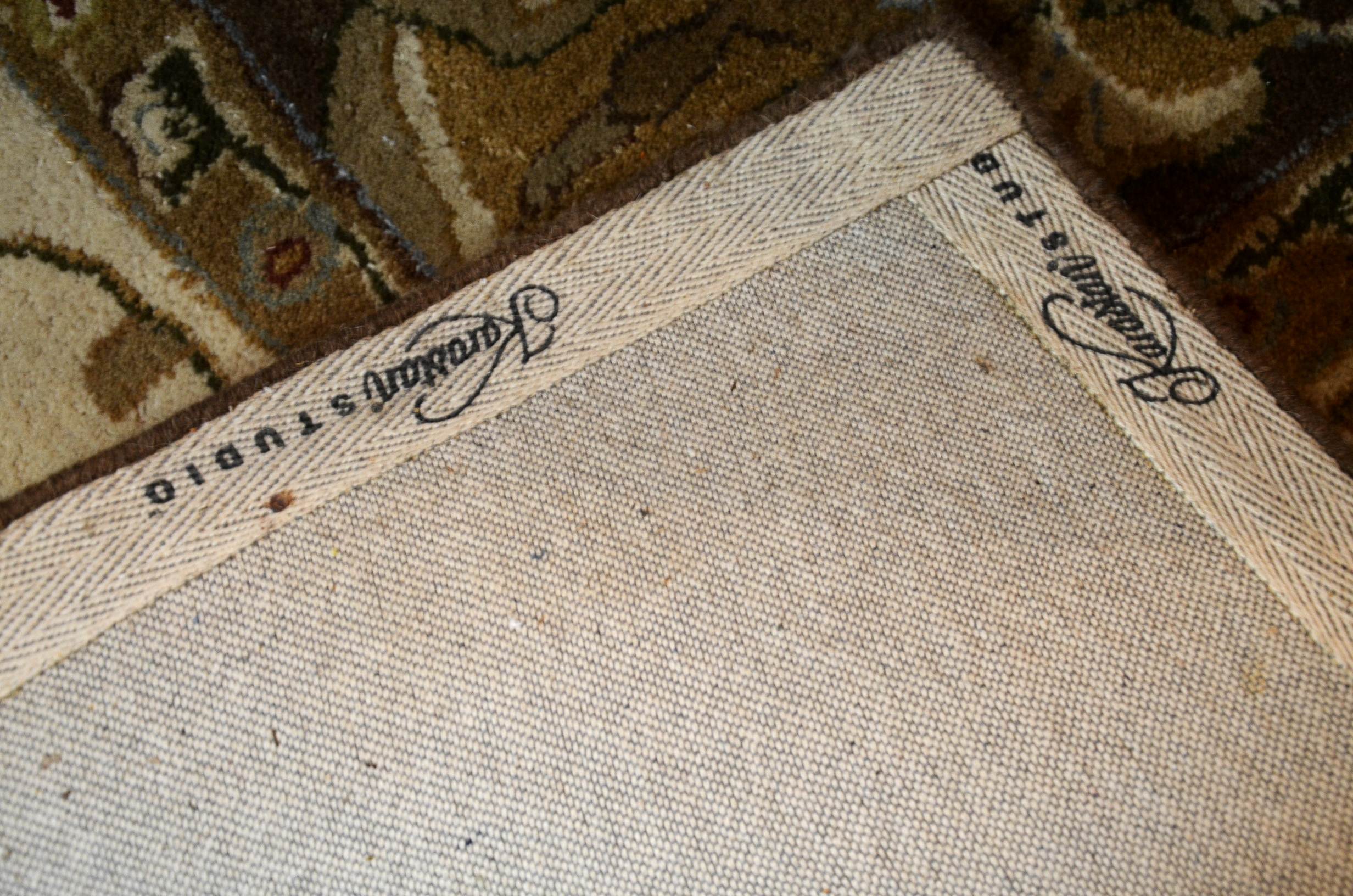 Studio Karastan wool area rug.