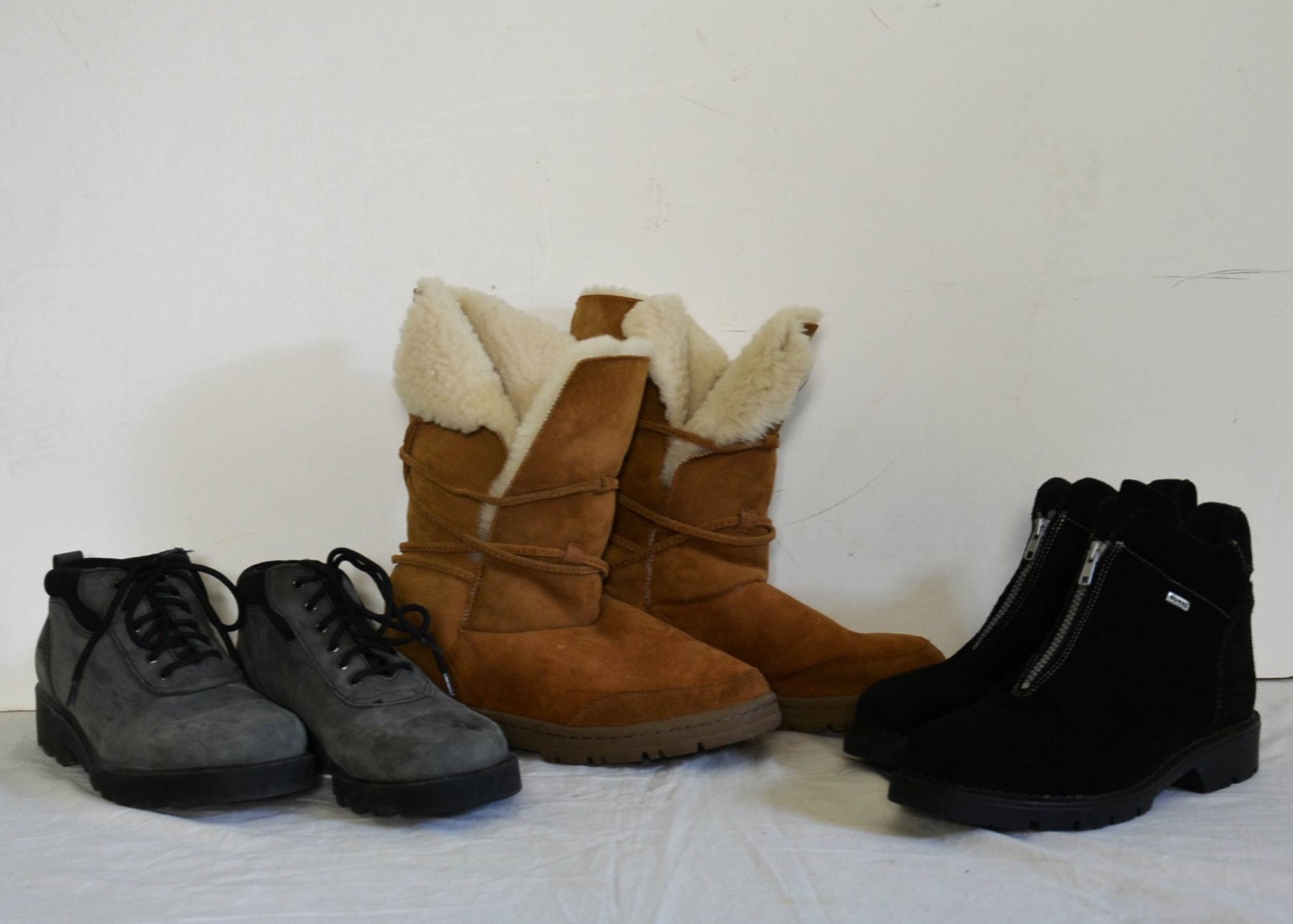 Three pair of winter boots.