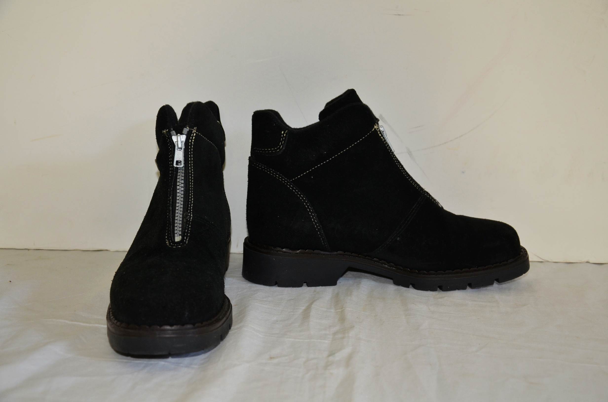 Three pair of winter boots.