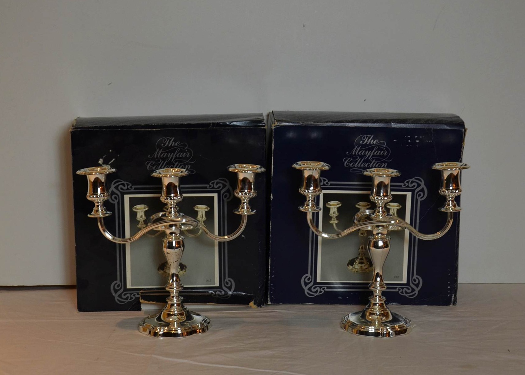 J.W. Bonser Ltd. silver tone candelabra pair.