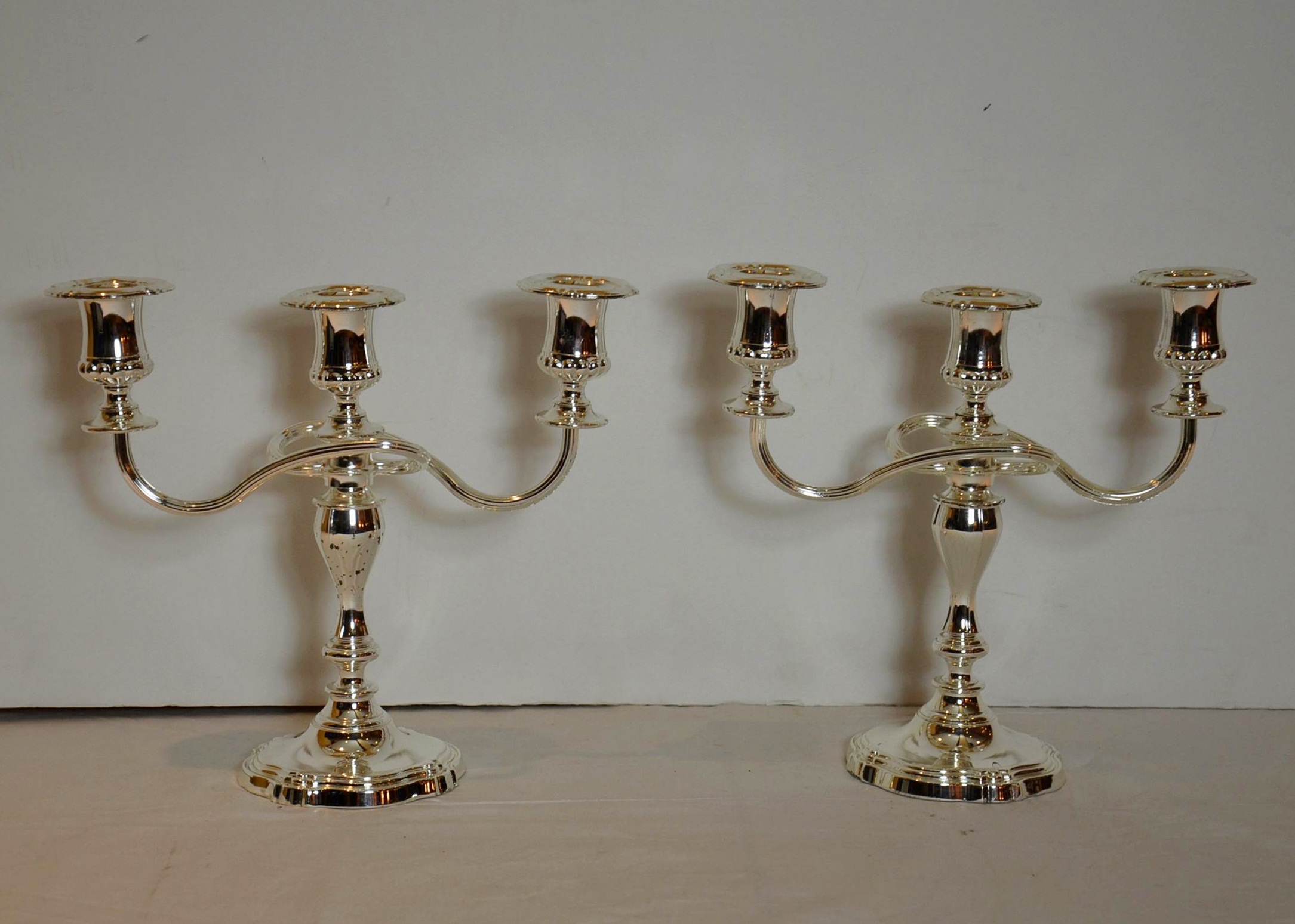 J.W. Bonser Ltd. silver tone candelabra pair.