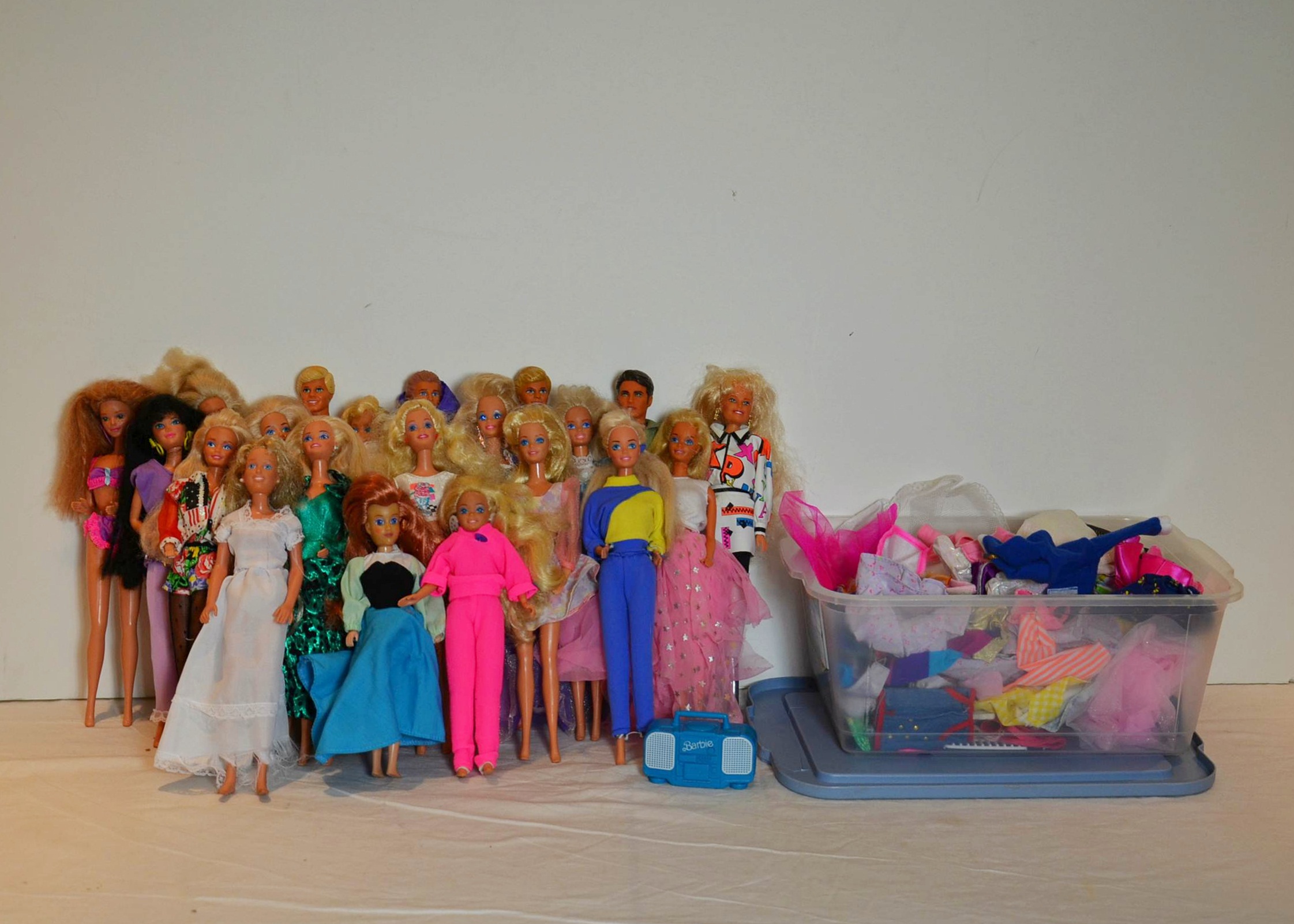 Medley of Barbie Dolls and Barbie clothes.