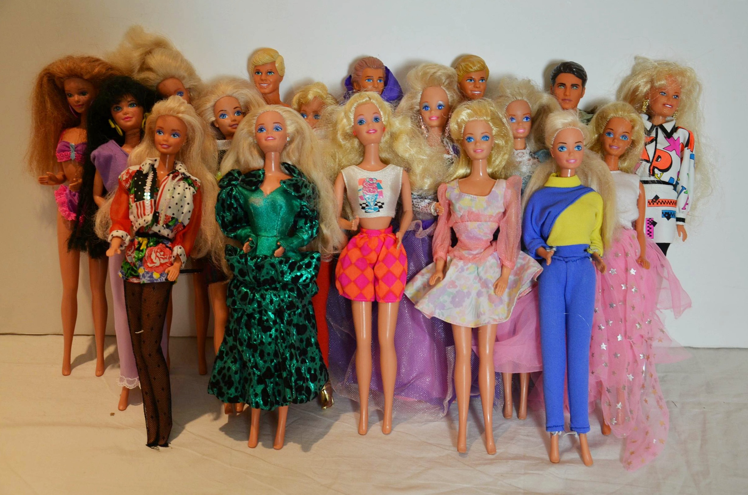 Medley of Barbie Dolls and Barbie clothes.