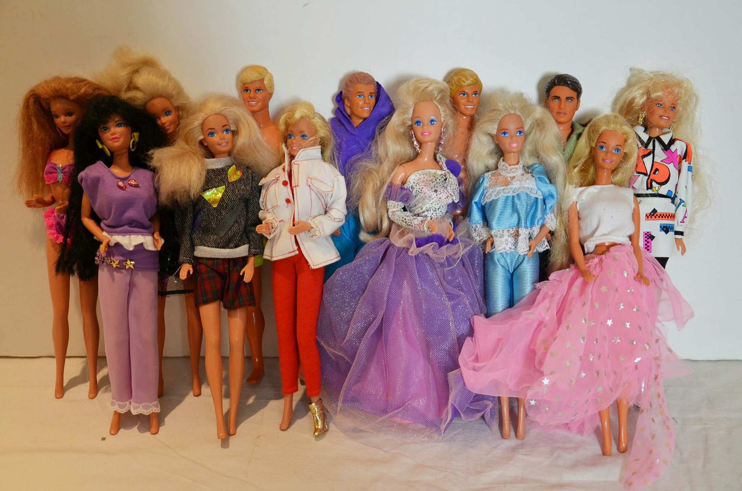 Medley of Barbie Dolls and Barbie clothes.