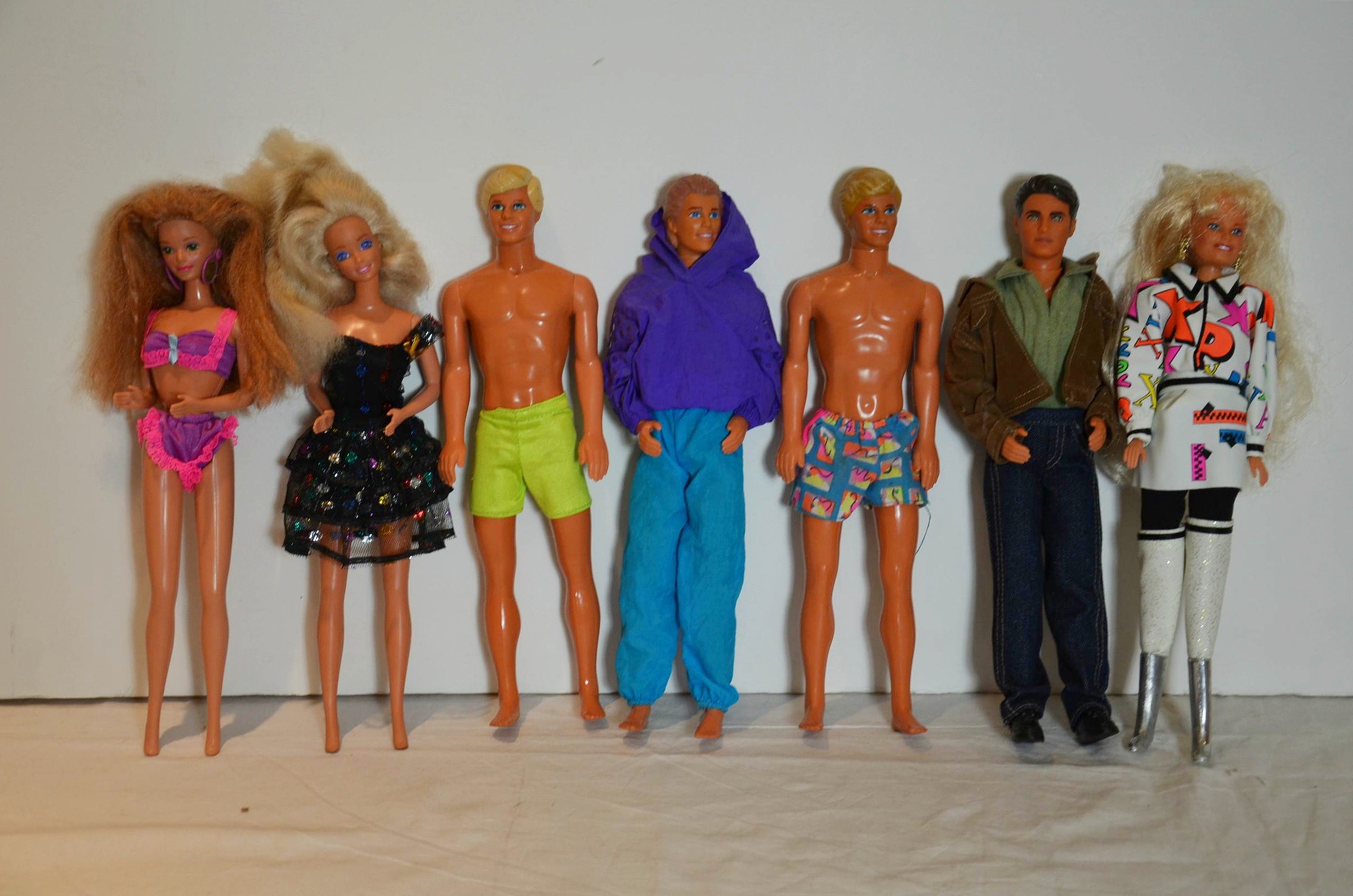 Medley of Barbie Dolls and Barbie clothes.