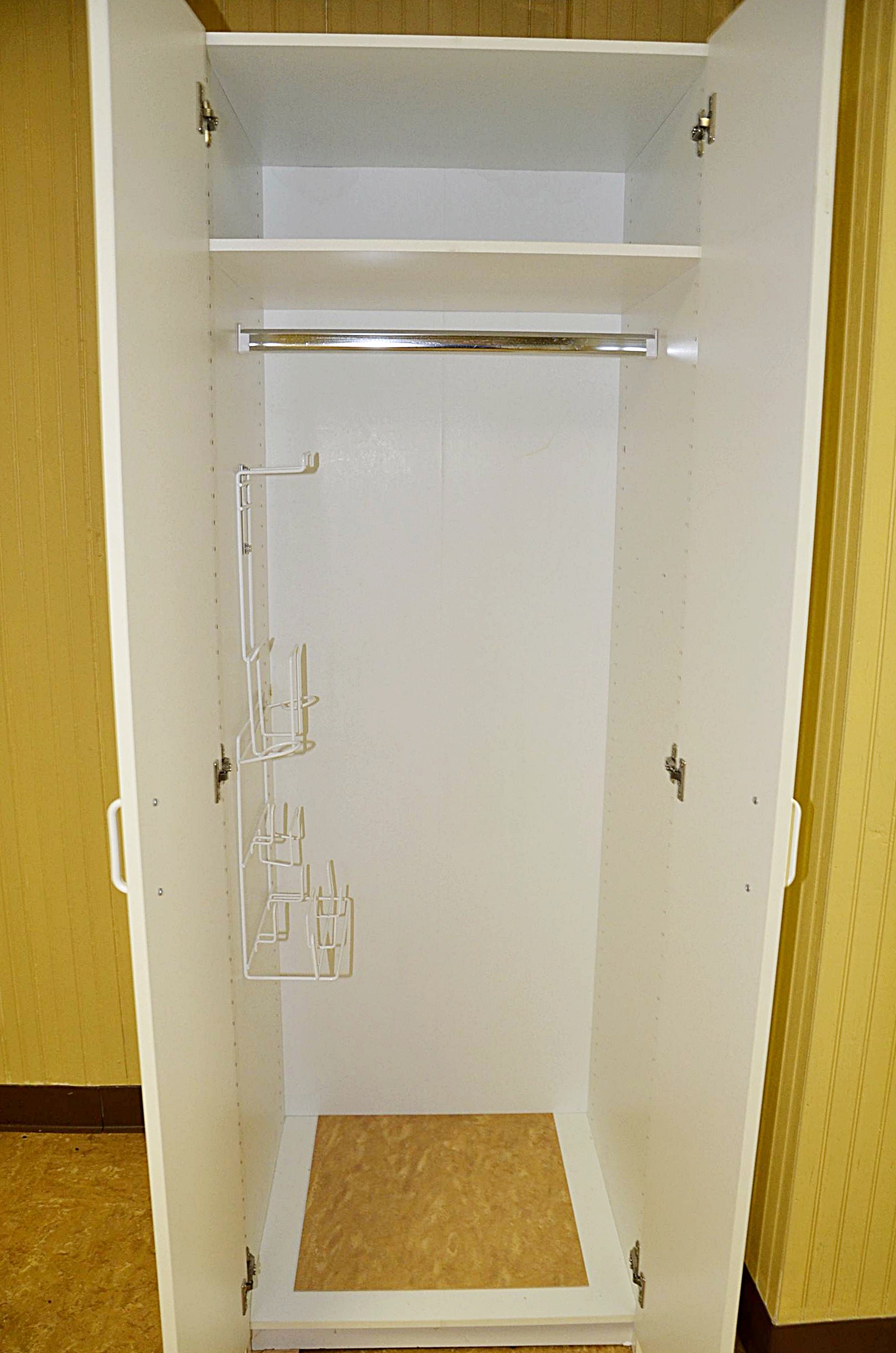 White laminate storage unit.